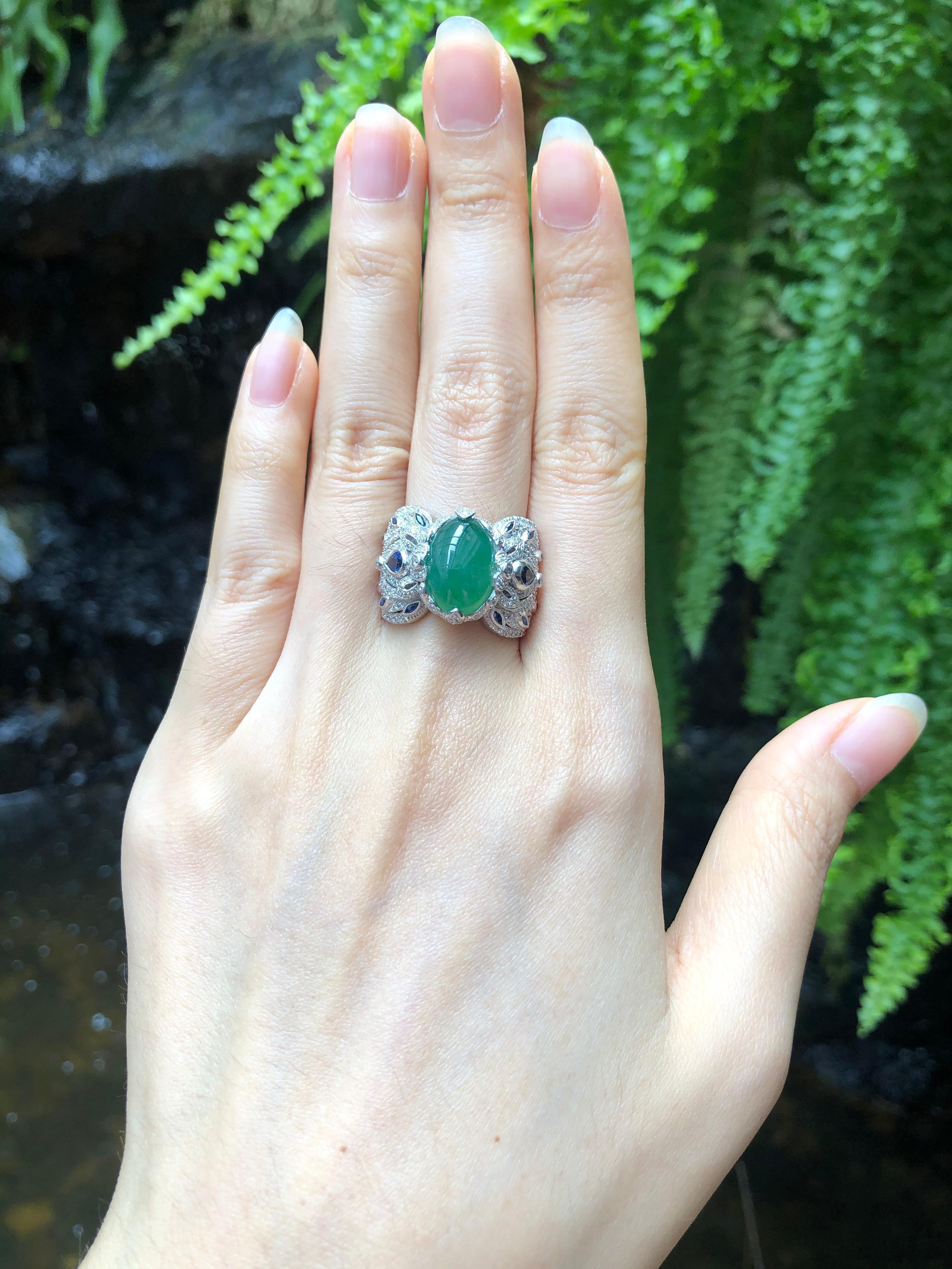 Jade 4.65 carats with Blue Sapphire 0.70 carats and Diamond 1.17 carats Ring set in 18 Karat White Gold Settings

Width:  1.1 cm 
Length: 1.5 cm
Ring Size: 54
Total Weight: 19.42 grams

