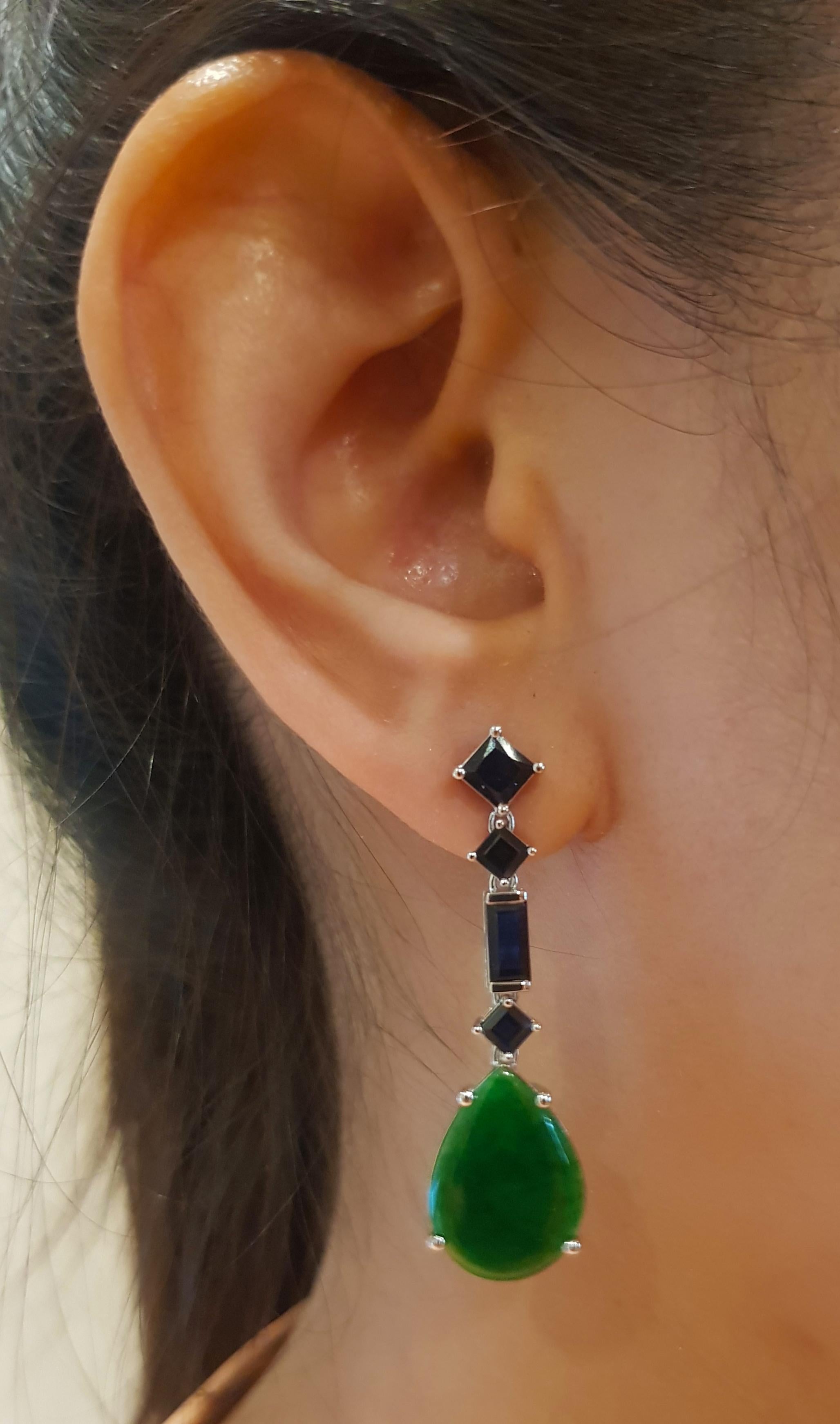 Jade 5.46 carats with Blue Sapphire 3.49 carats Earrings set in 18K White Gold Settings

Width:  1.2 cm 
Length: 4.2 cm
Total Weight: 8.7 grams


