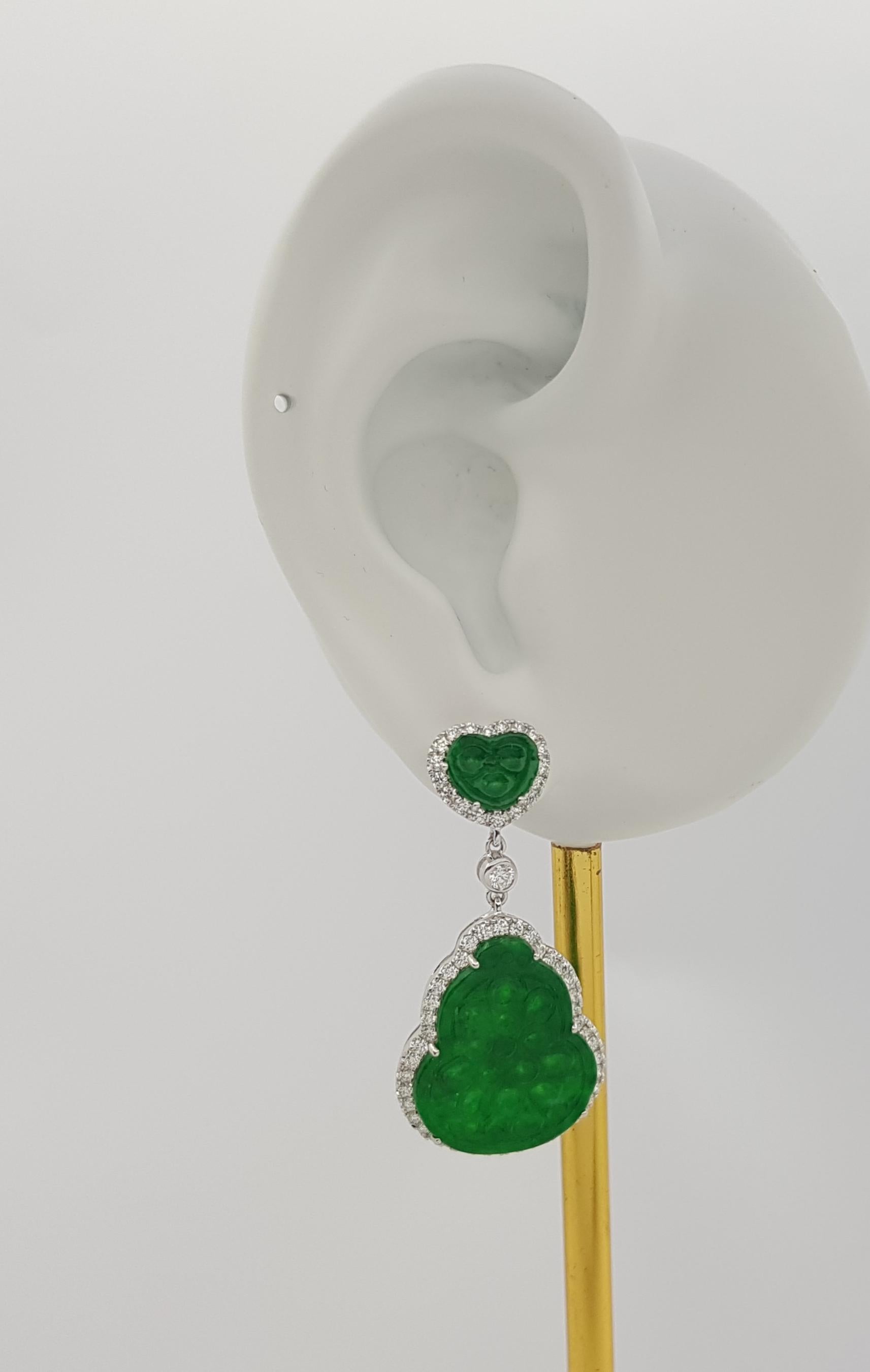 Jade 9.63 carats with Diamond 1.20 carats Earrings set in 18K White Gold Settings

Width: 1.8 cm 
Length: 4.0 cm
Total Weight: 10.82 grams

