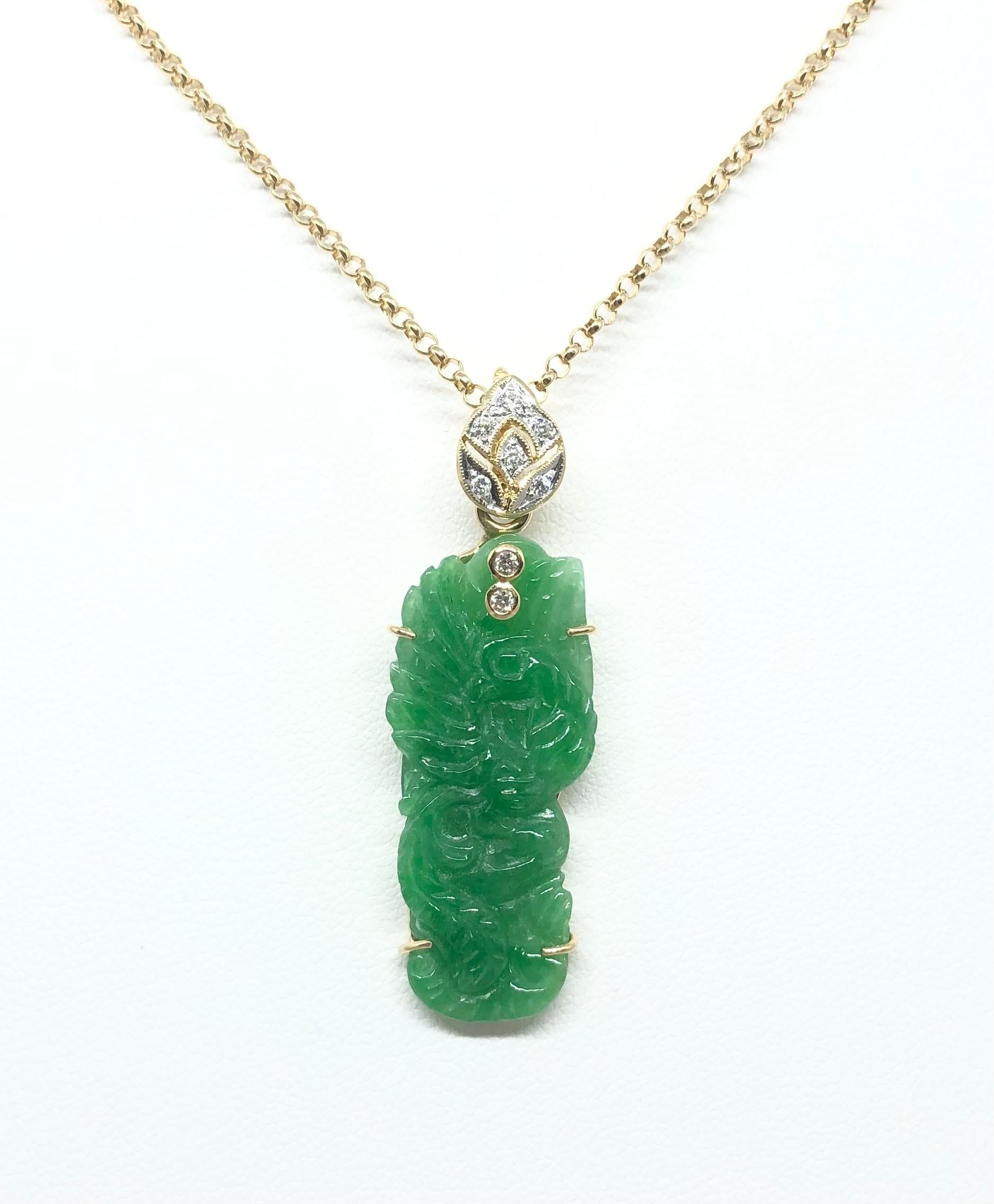 Jade with Diamond 0.08 carat Pendant set in 18 Karat Gold Settings
(chain not included)

Width: 1.4 cm 
Length: 4.2 cm
Total Weight: 4.29  grams


