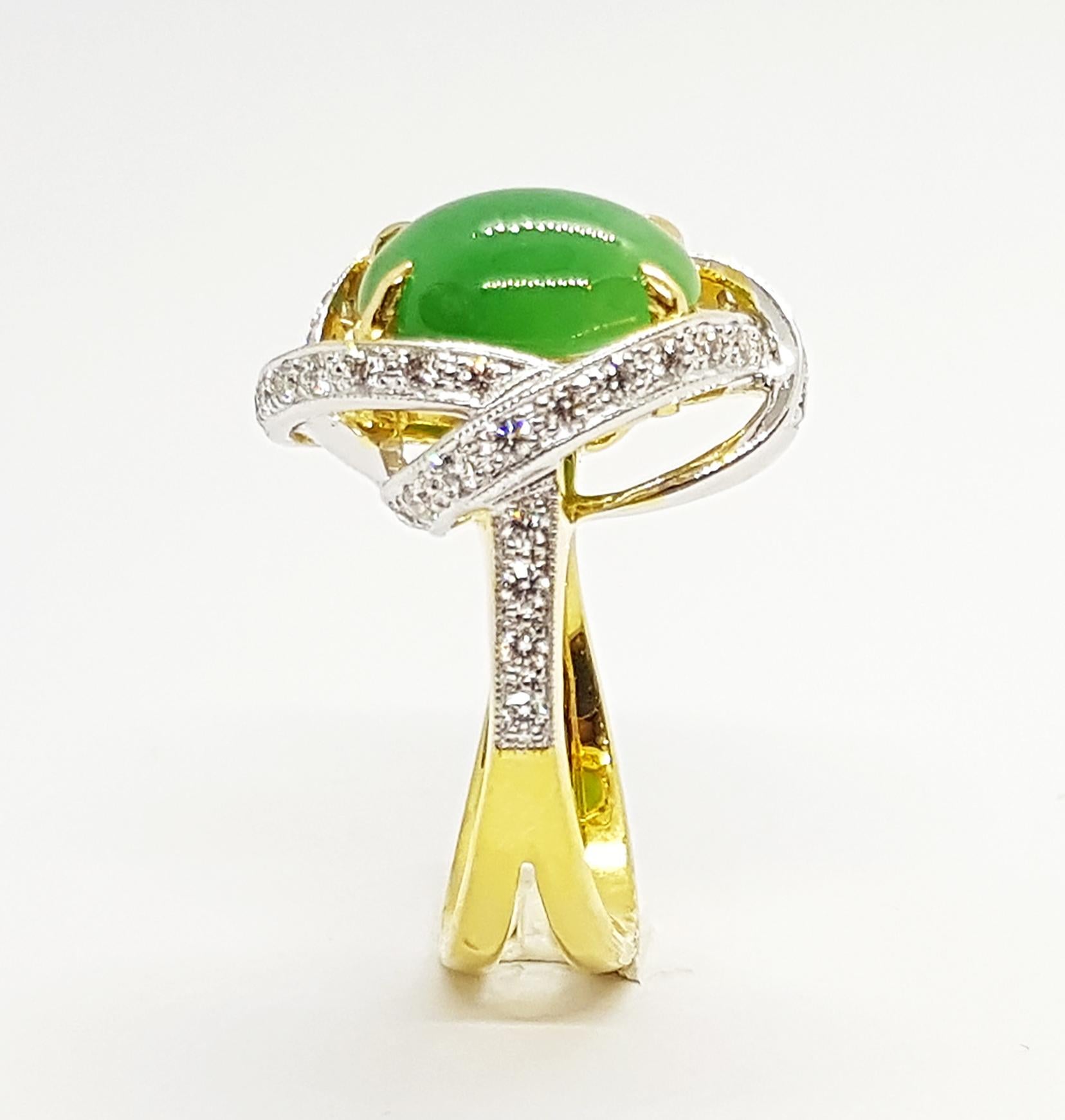 Bague en jade avec diamant de 0,48 carat sertie d'or 18 carats

Largeur :  1.4 cm 
Longueur : 1,8 cm
Taille de l'anneau : 50
Poids total : 7,82 grammes

