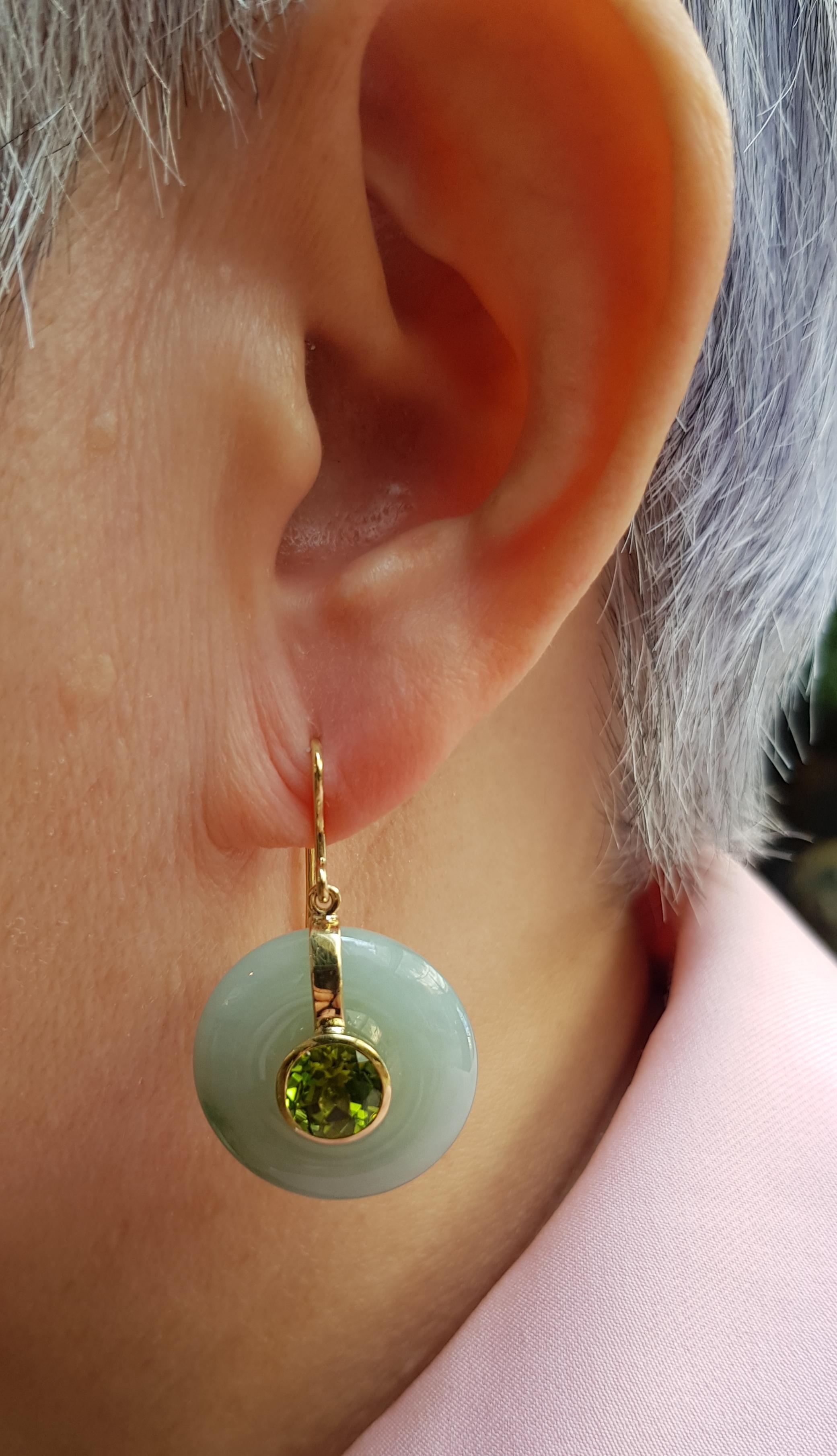 Jade 71.72 carats with Peridot 4.24 carats Earrings set in 18 Karat Gold Settings

Width: 2.3 cm
Length: 4.0 cm 

