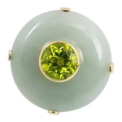 Anello di giada con peridoto incastonato in oro 18 carati
