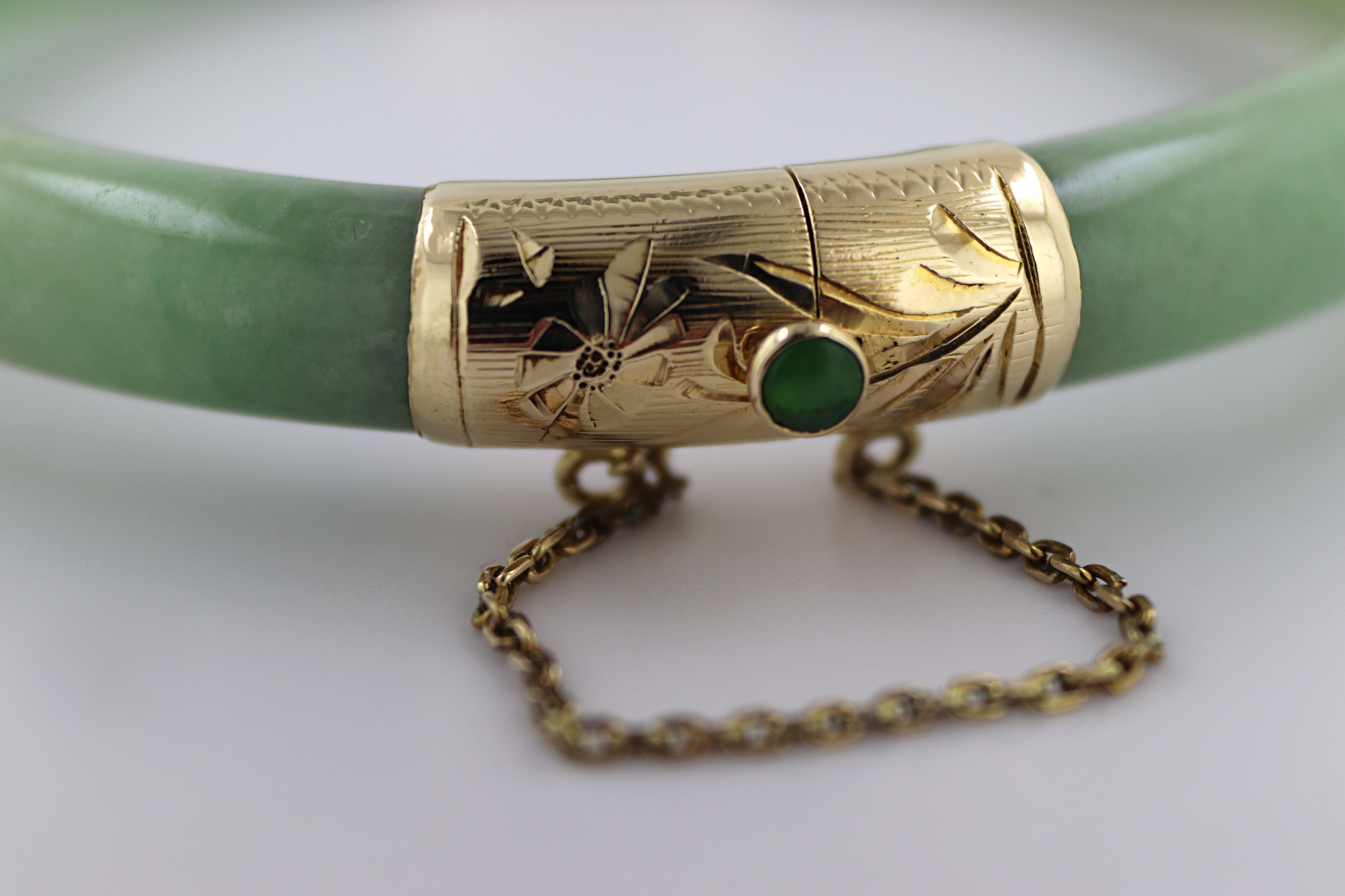 jade bangle with gold clasp