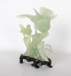 Jadeite Bird Figurine on Hand-Carved Trunk and Wooden Base