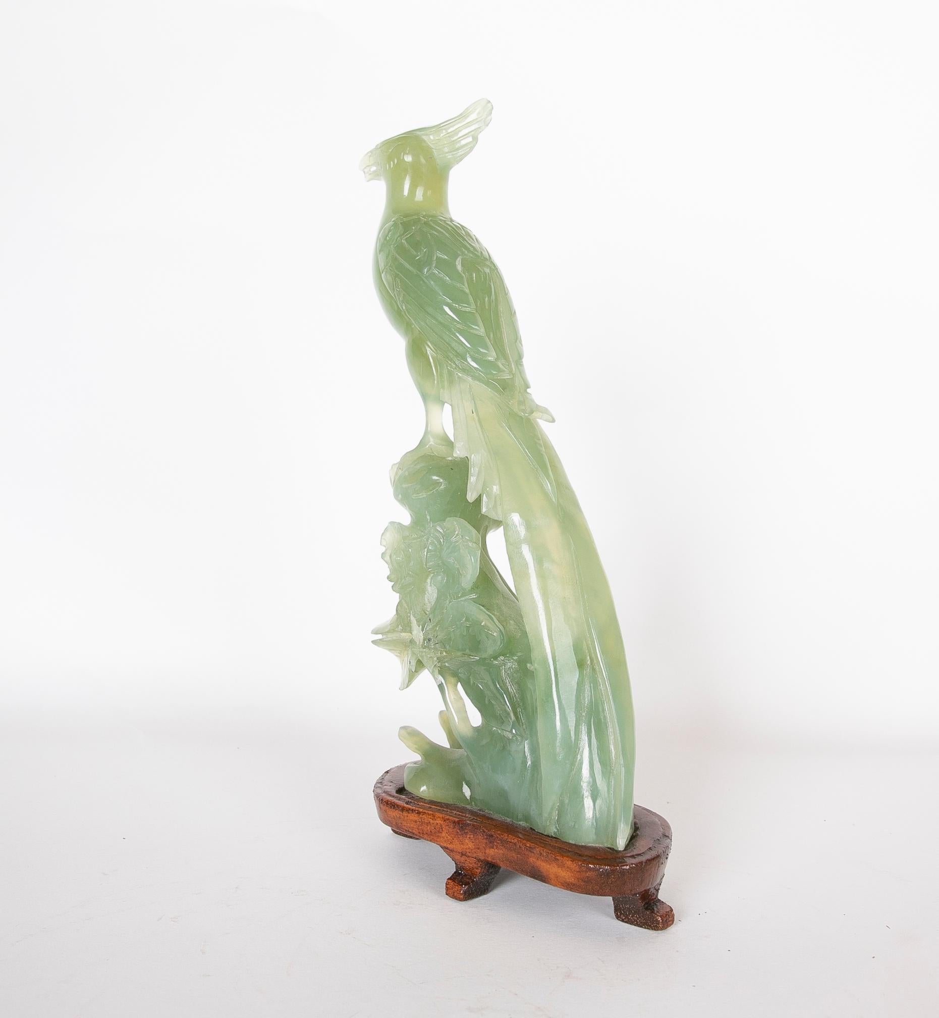 Stone Jadeite Bird Figurine on Hand-Carved Trunk and Wooden Base For Sale