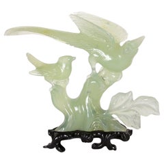 Used Jadeite Bird Figurine on Hand-Carved Trunk and Wooden Base
