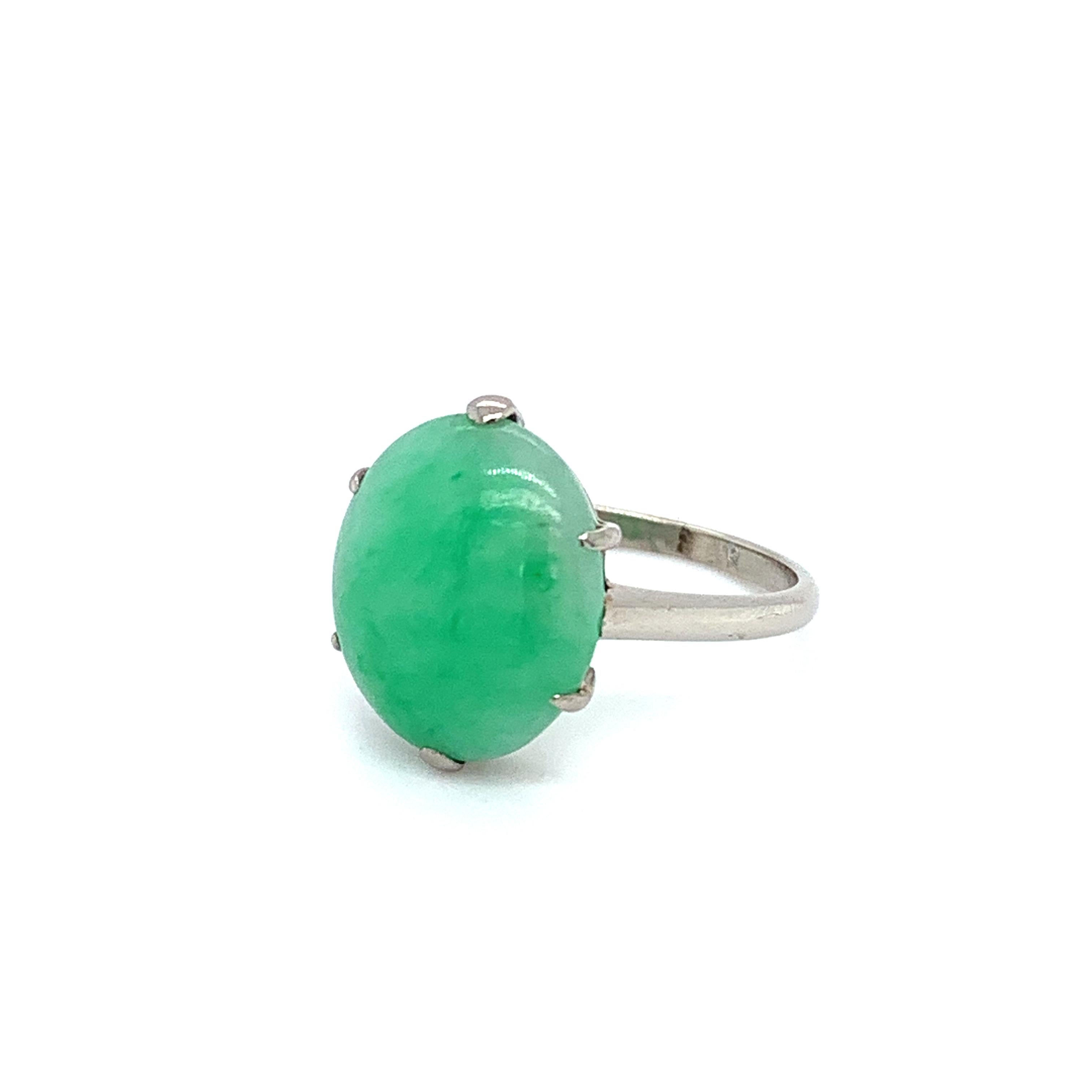 Jadeite green jade art deco cocktail ring 18k white gold
Oval shaped jadeite gemstone natural untreated total weight 5.00ct 
Measuring approximately 16x12mm
The ring can be resized
Band width approximately 2mm
Hallmark 
The ring can be resized
Size