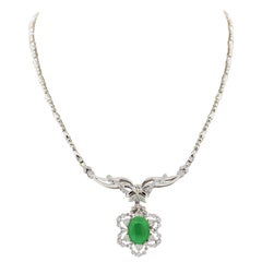 Collier en platine avec jadéite, jade et diamants