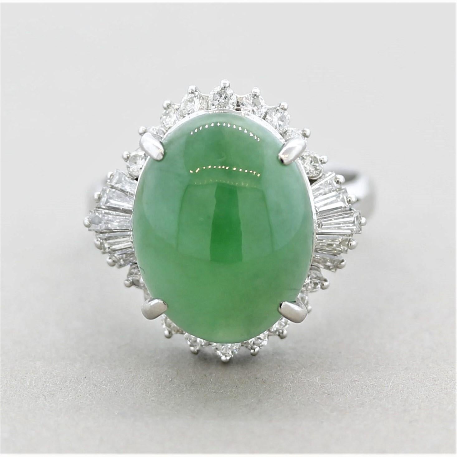 A fine and stylish jade ring! The jade weighs 7.34 carats and has a soft sweet green color with excellent luster and light appears to roll across the stone like silk. It is accented by 0.71 carats of round brilliant-cut and baguette-cut diamonds set