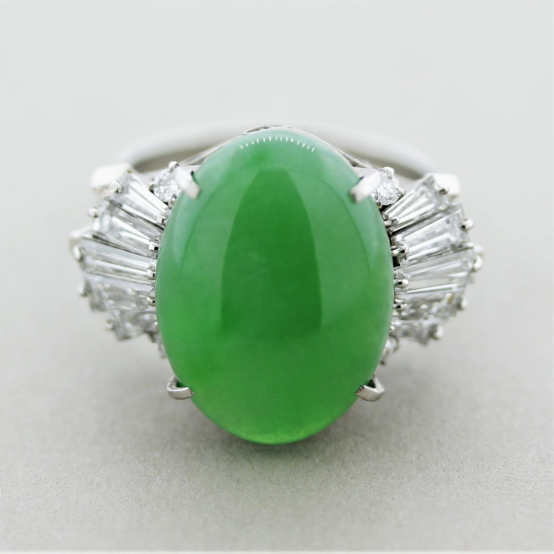 A large jadeite jade takes center stage of this platinum ring. It has an even oval shape with a bright and lively green color. It is accented by 1.28 carats of baguette and round brilliant-cut diamonds set on its sides in a stylish pattern.