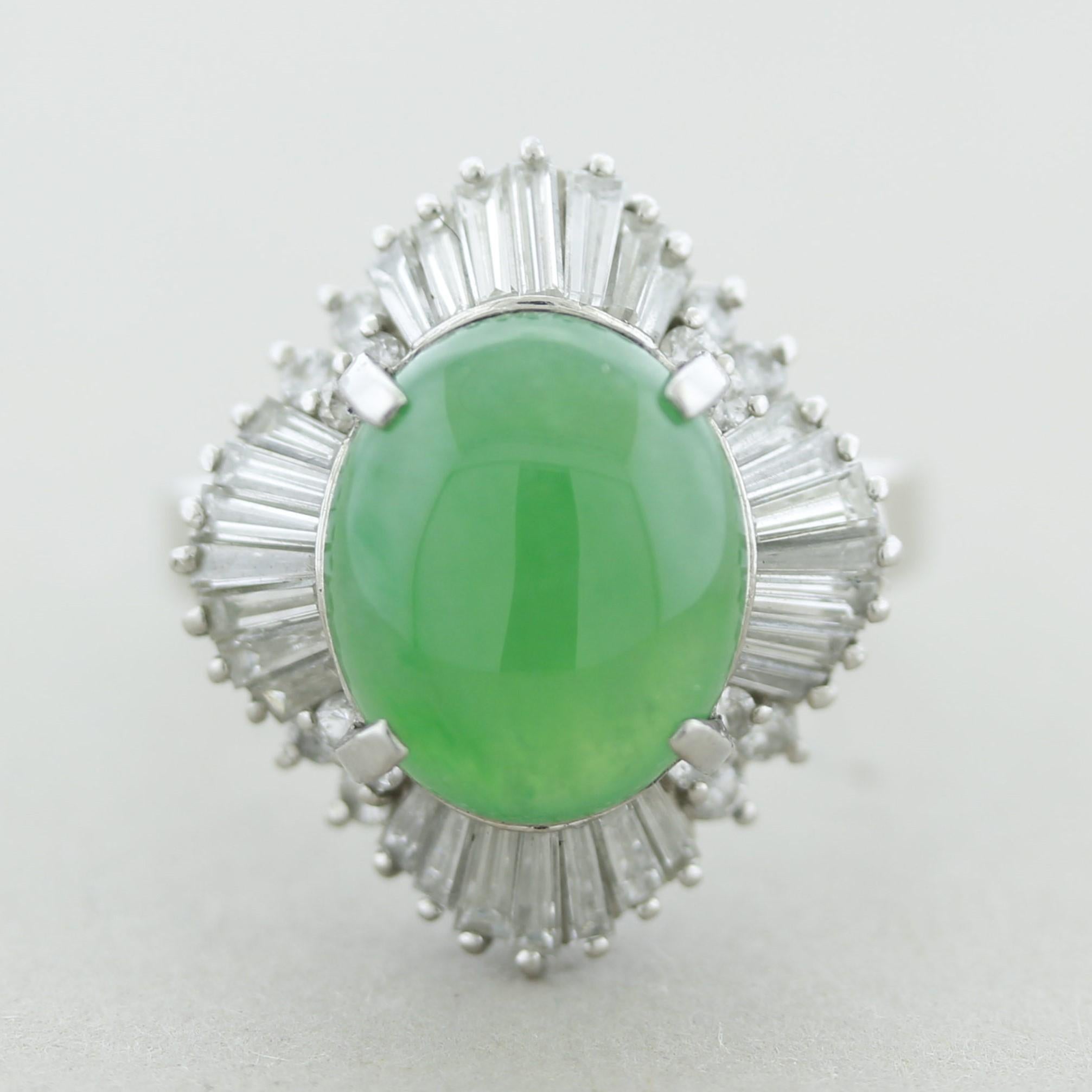 A lovely natural jade & diamond ring. The jade has a bright green color with excellent luster and weighs 5.95 carats. It is accented by 1.65 carats of round brilliant and baguette-cut diamonds set around the jade in a stylish pattern.