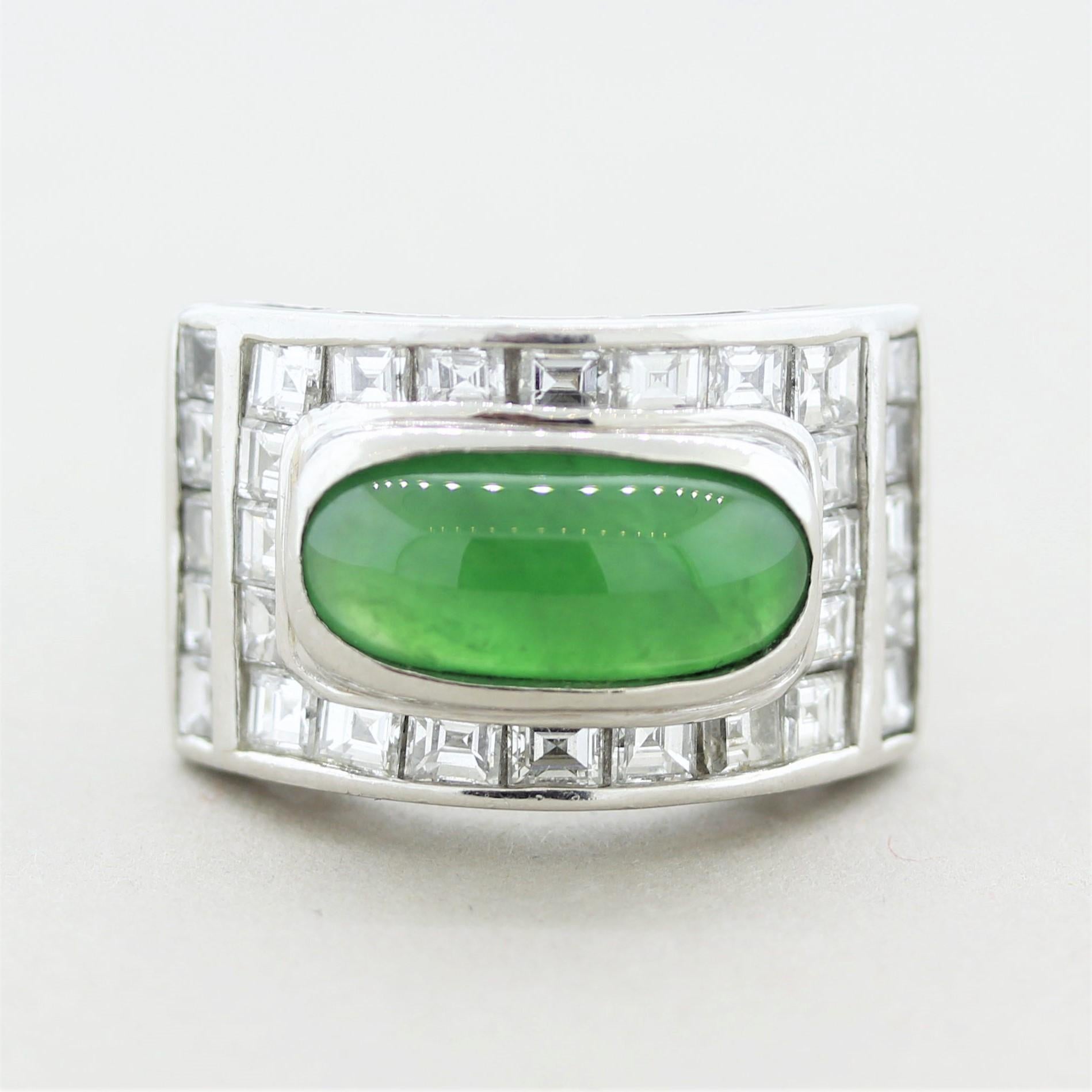 A large, fine, and impressive ring featuring a natural jadeite jade weighing 4.89 carats. The jade is certified by the GIA as natural color with no treatment, “Type A.” It is complemented by 2.94 carats of fine bright white asscher-cut diamonds