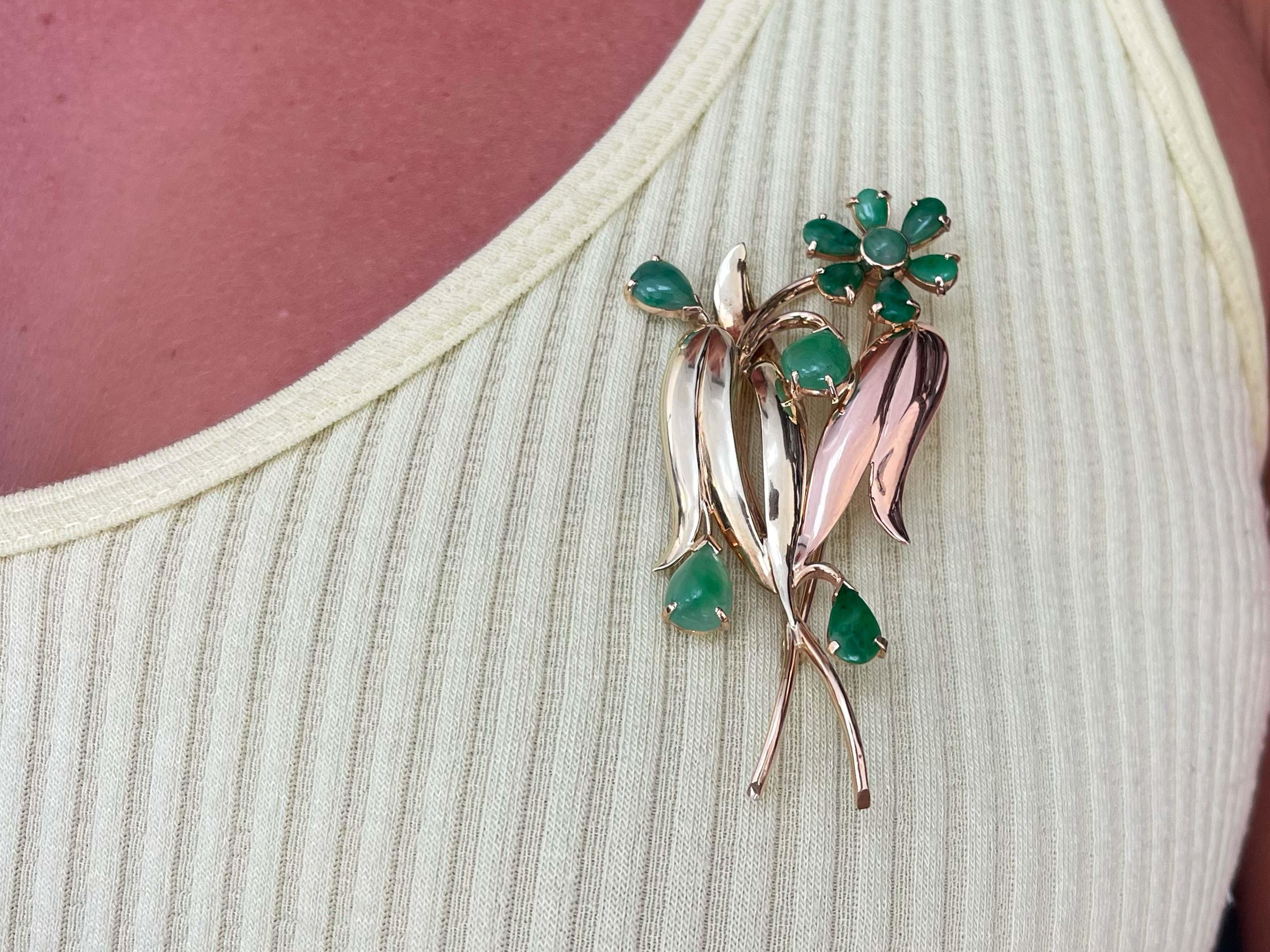 Brooch Specifications:

Metal: 14k Yellow and Rose Gold

Total Weight: 14.9 Grams

Stone: Green Jadeite Jade 

Brooch Measurements: 2.75