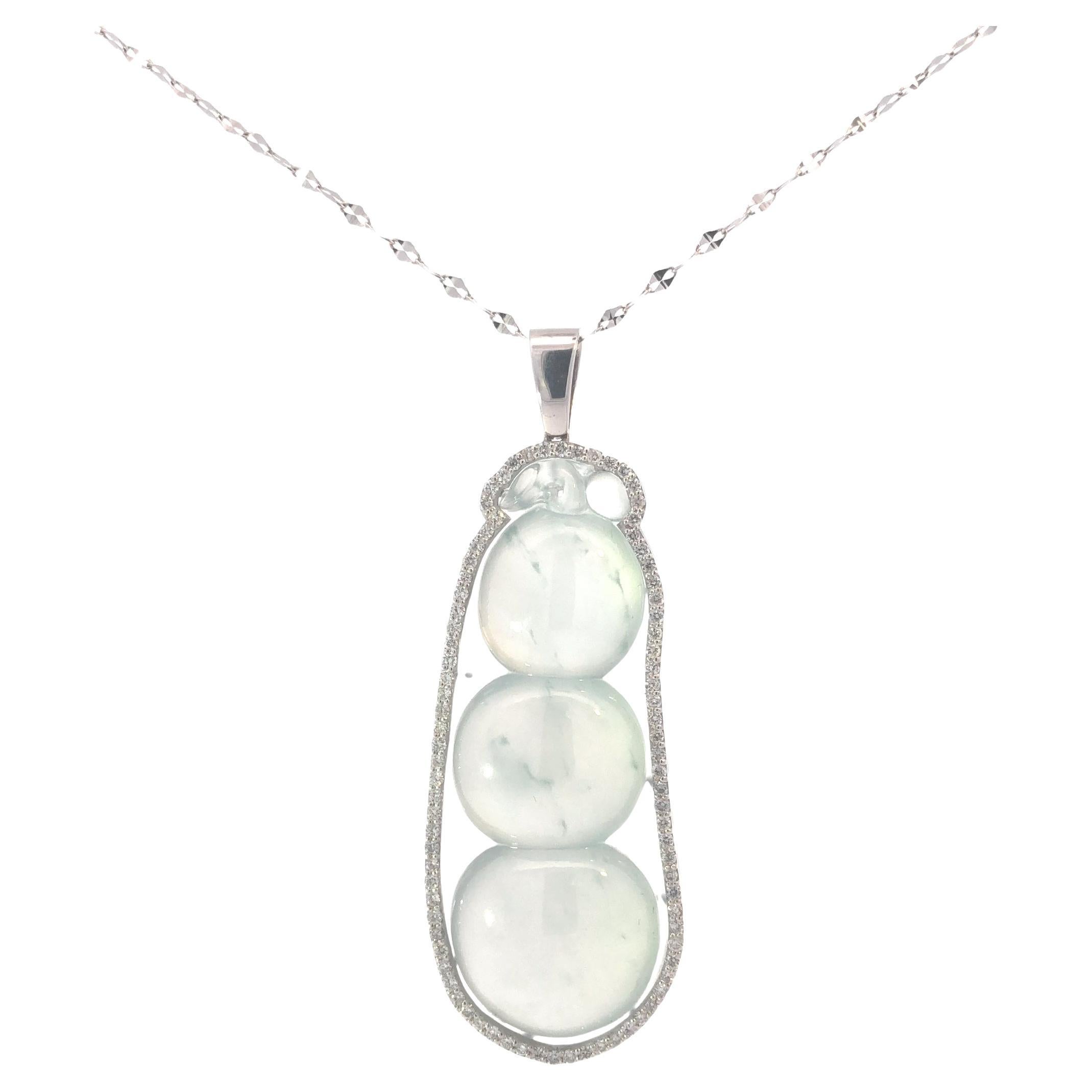 Articolo #8075

Certificato GIA 
Ciondolo con piselli di giada in giadeite 18K e diamanti
Un (1) intaglio traforato incastonato in un ciondolo di metallo bianco con numerosi brillanti rotondi quasi incolori.

Pietra preziosa colorata: Giada