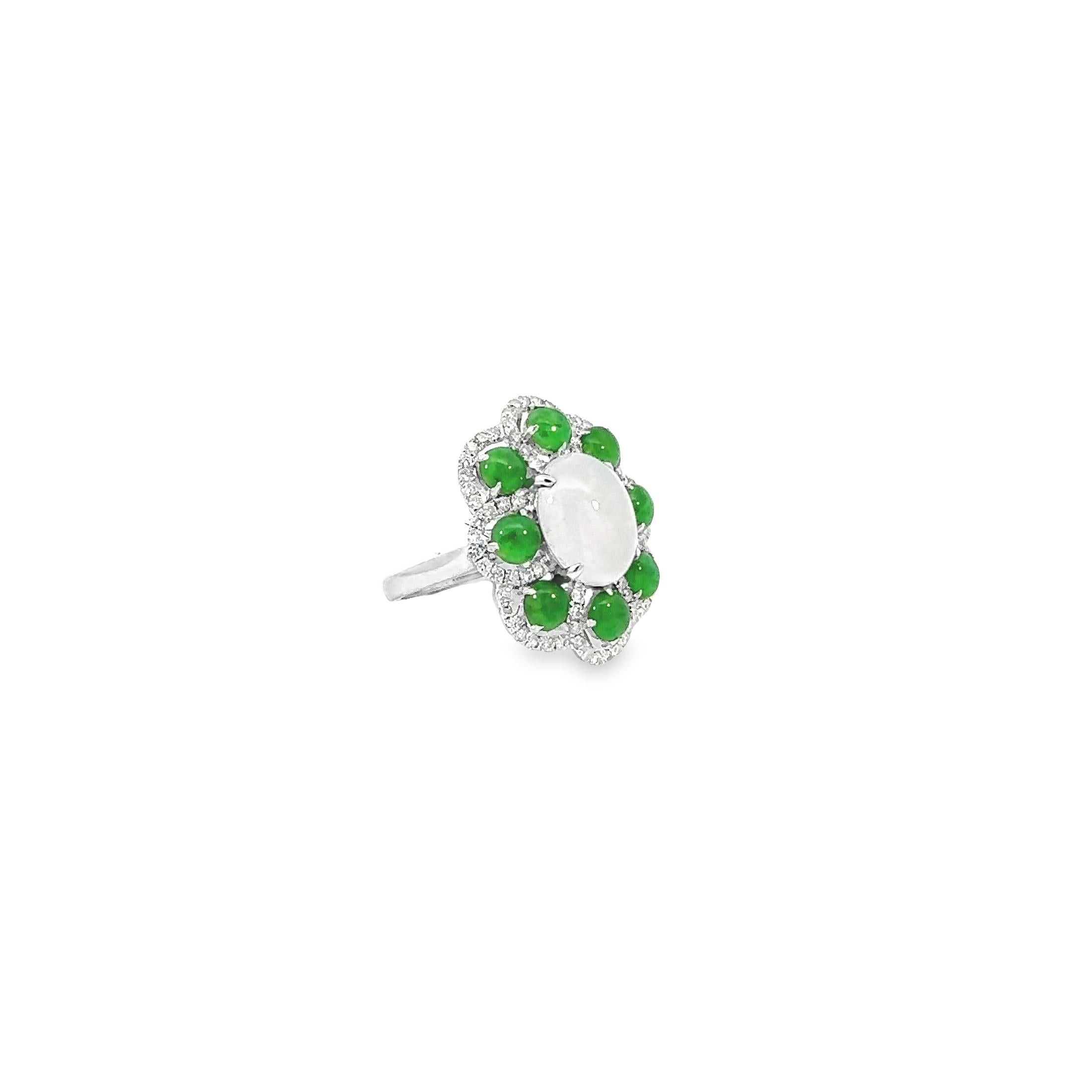 Item #8130

GIA Certified 
18K Ladies Jadeite Jade Ring with Diamonds
Center stone set in a white metal ring. 
Shape: Oval
Cut: Double Cabochon
Weight: 5.79 grams
Species: Jadeite Jade 