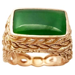 Jadeite Ring set in 18K Rose Gold Settings