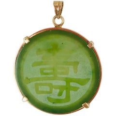Jadeite, Translucent 14 Karat Gold Pendant, circa 1950s