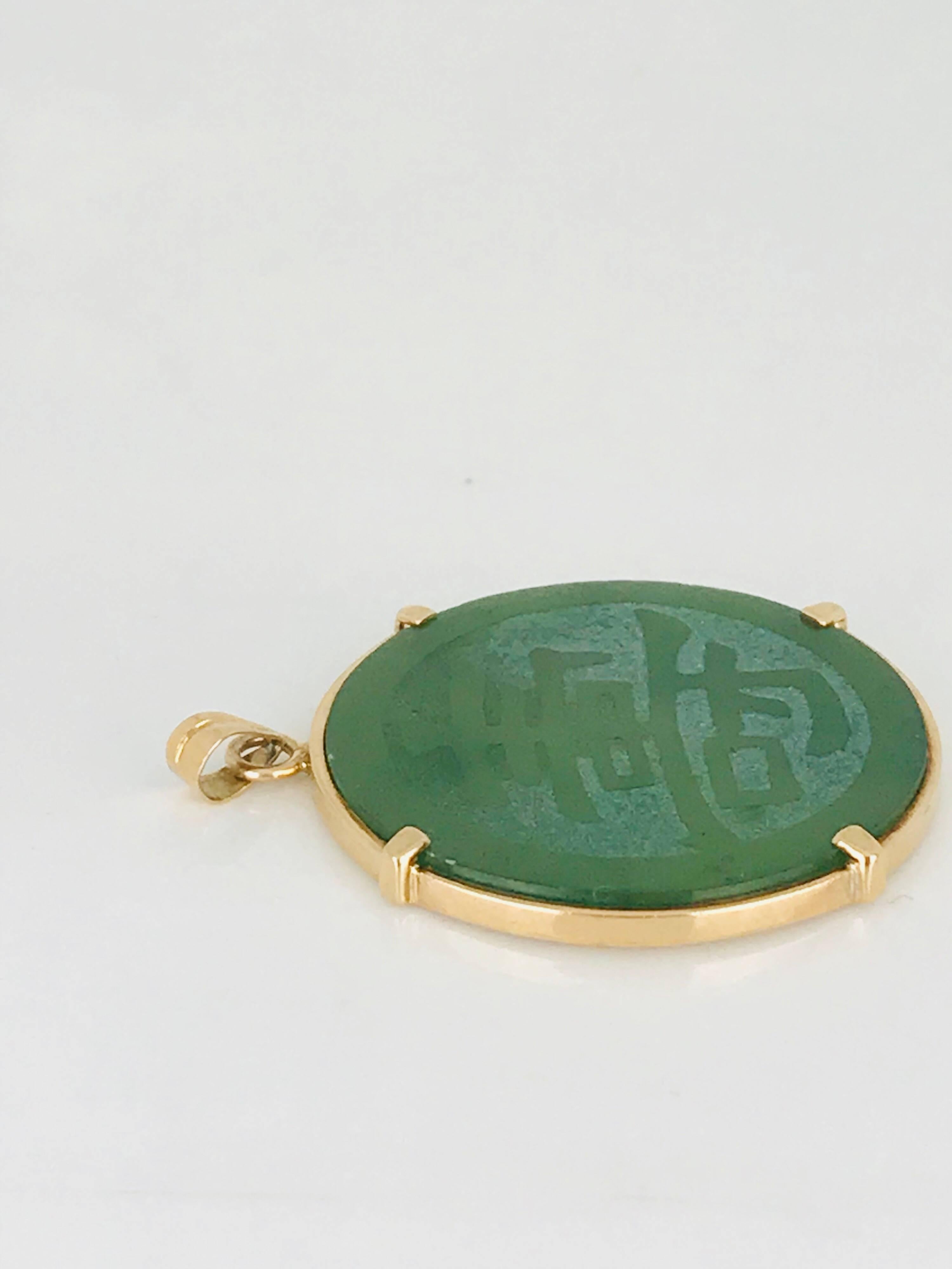 Round Cut Jadeite, Translucent 14 Karat Gold Pendant, circa 1950s For Sale