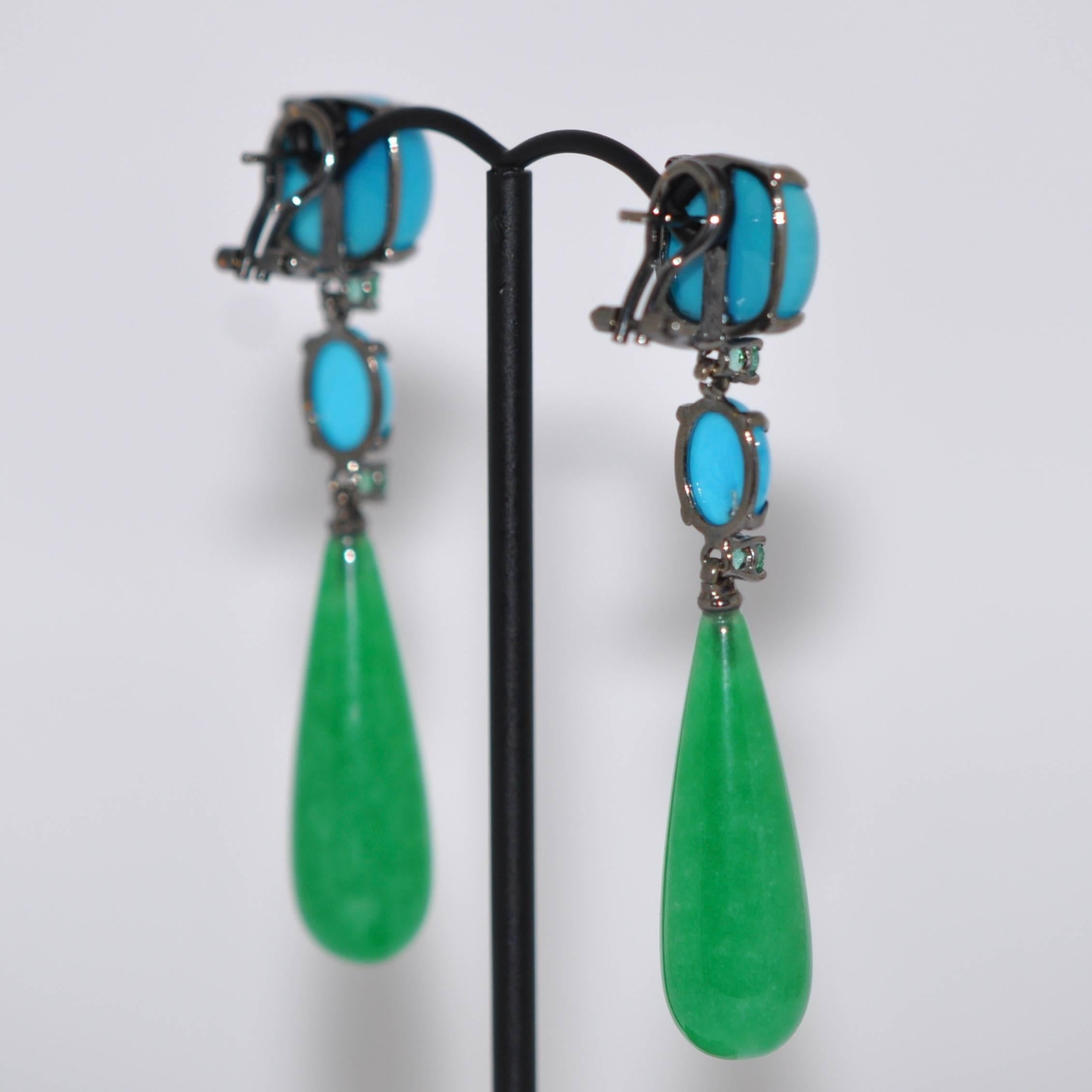 Discover This Jades, Turquoises and Emeralds Black Gold Chandelier Earrings.
Jades
Turquoises 
Emeralds
Black Gold 18 Carat
