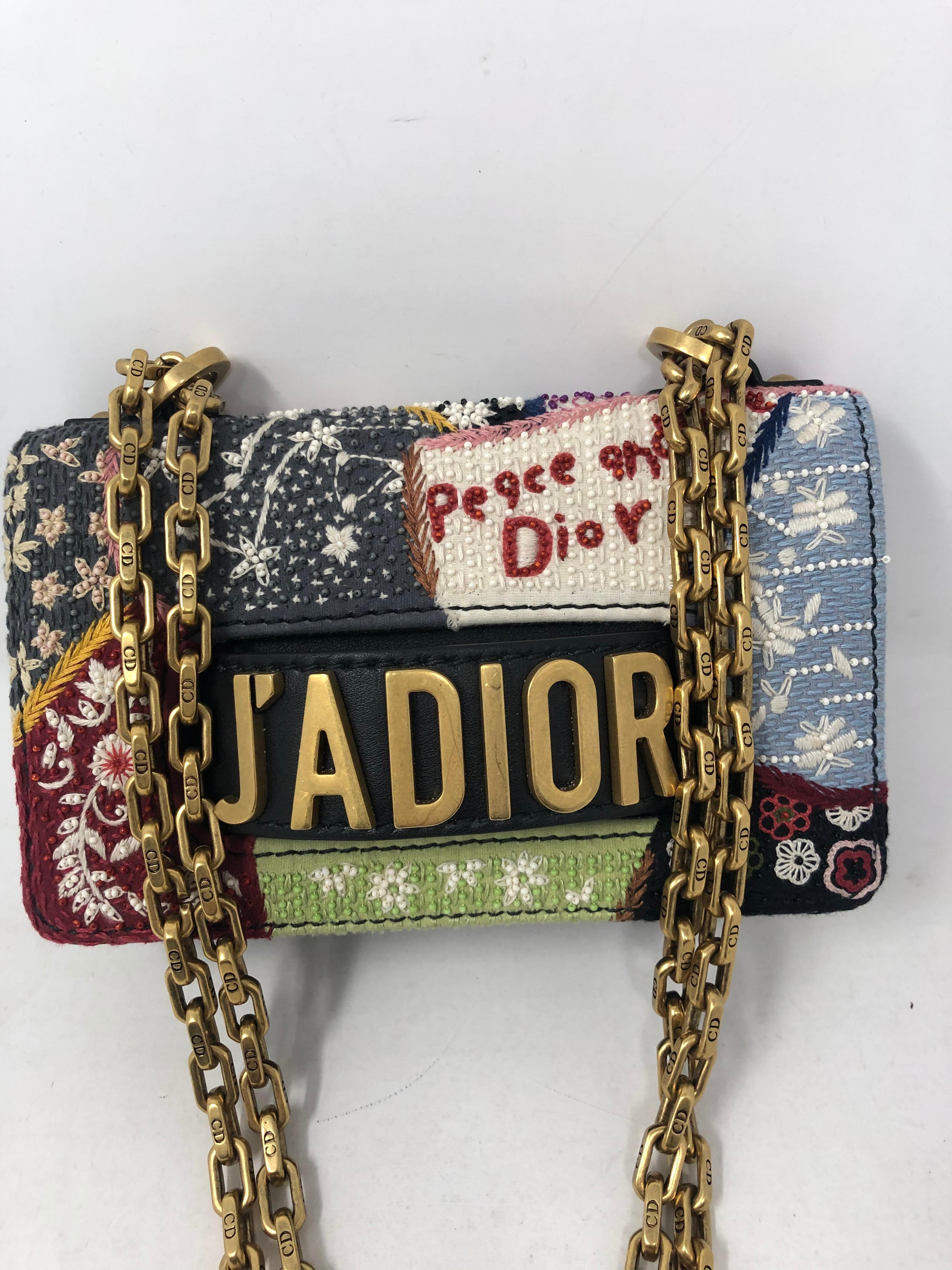 J'adior Peace and Dior Mini Crossbody Bag. Beaded and handstitched beautiful bag. Rare and Collector's piece. Never worn. Brand new condition. Don't miss out. Guaranteed authentic. 