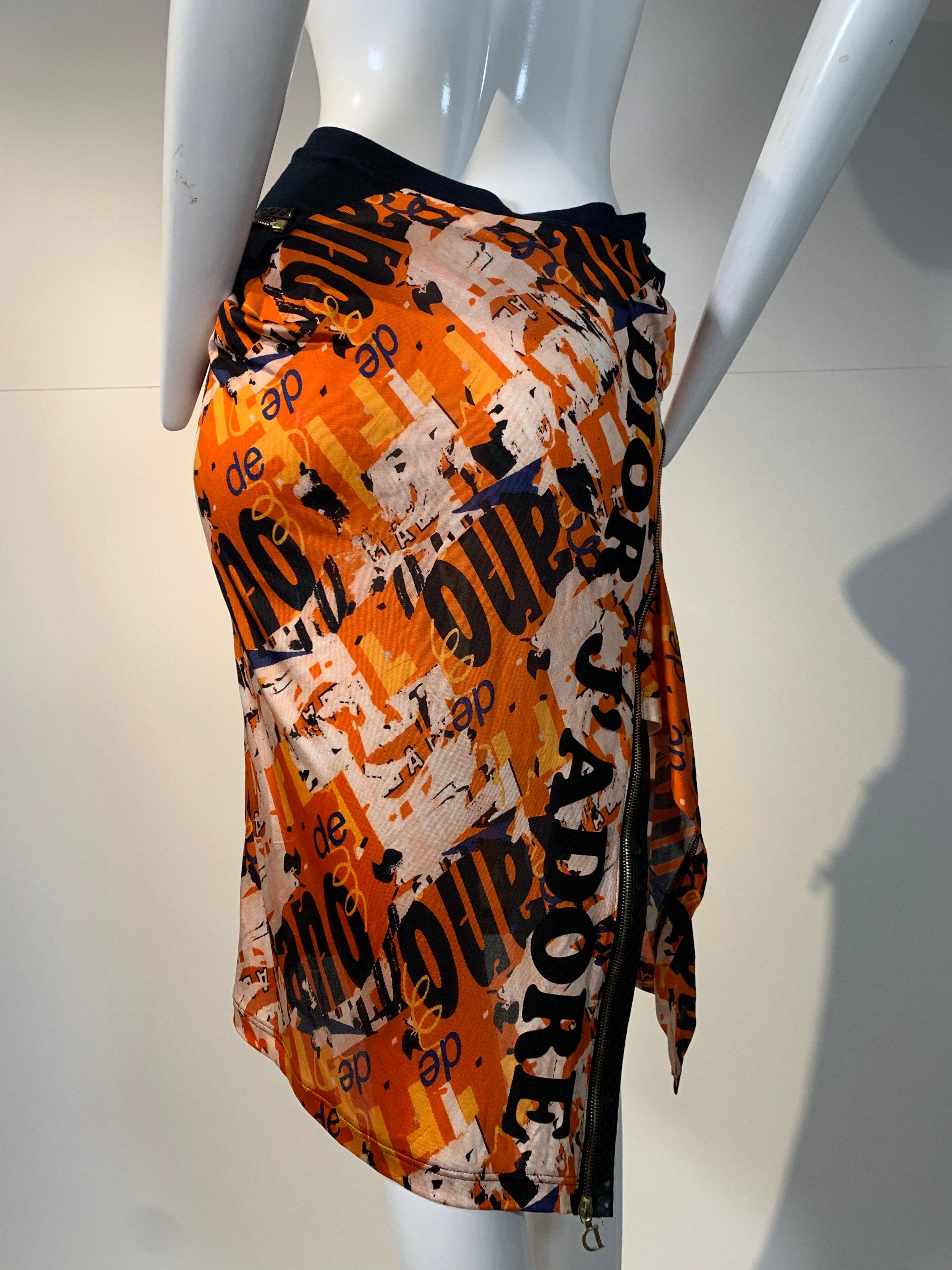 J’Adore Christian Dior by John Galliano orange graphic print silk jersey skirt. Side exposed zipper with snakeskin placket and 