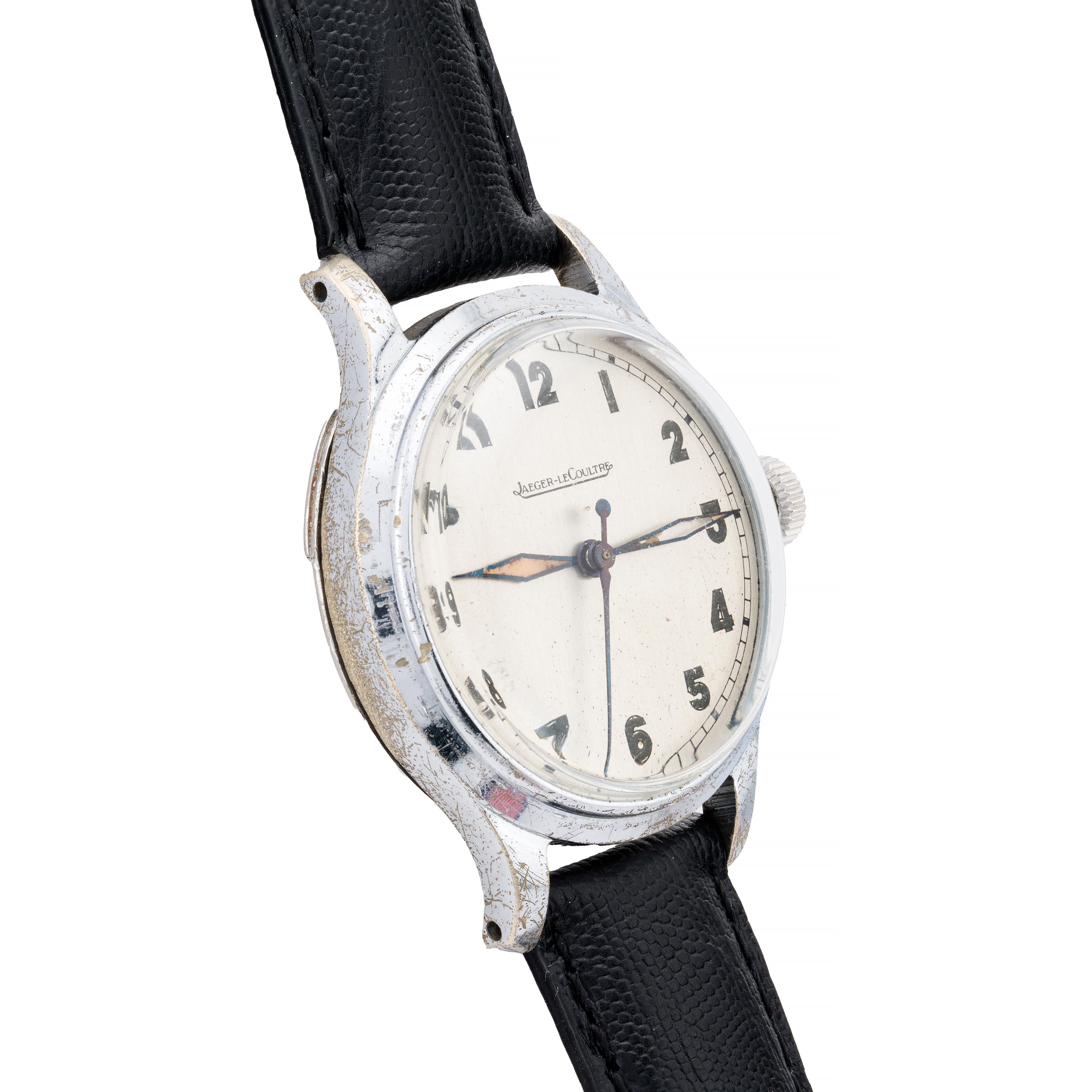 Aston Estate Jewelry Presents:

A Jaeger-LeCoultre military issue wristwatch crafted in base metal and stainless steel. The round case houses a luminous dial with bold Arabic numerals, ensuring visibility in low light. The manual caliber P487