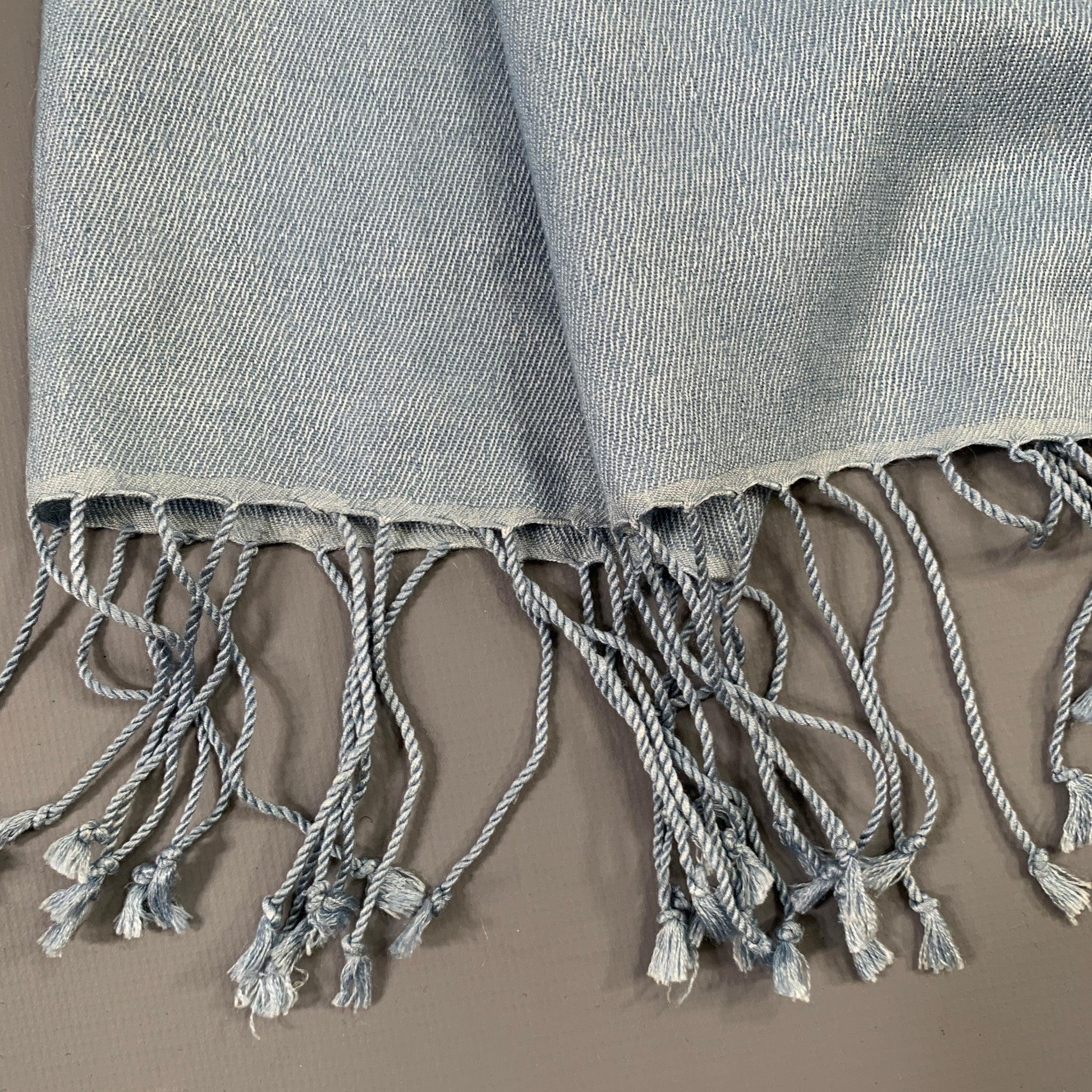 JAEGER pashmina shawl in a blue cashmere silk woven fabric featuring fringe.Very Good Pre-Owned Condition. Minor signs of wear. 

Measurements: 
  76 x 18.5 inches 
  
  
 
Sui Generis Reference: 137079
Category: Scarves & Shawls
More Details
   