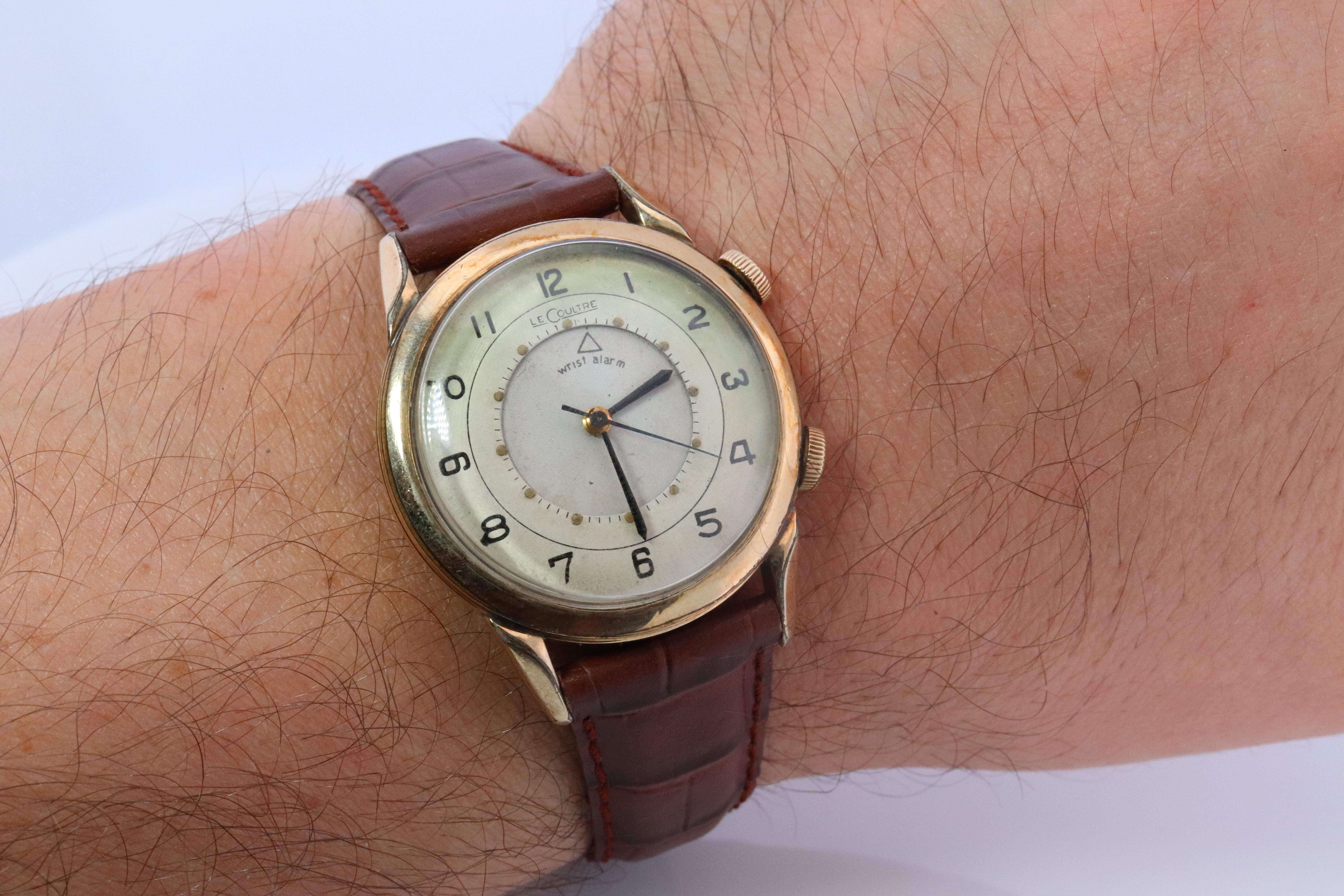 JAEGER LeCoultre
Wrist Alarm Watch
	Winds up, wonderful alarm at set time. Works.

Genuine Mens Watch.

Movement ref. 489/1 - Circa 1960s

10k gold filled Case.

34mm round

Condition: Has several scratches on the back. Winds up and works. Wonderful