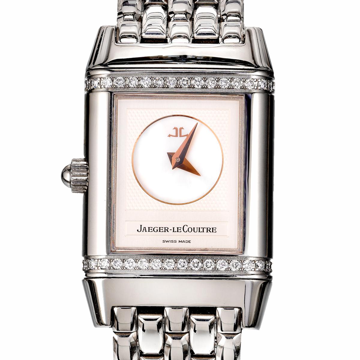 Jaeger-Le Coultre Reverso ladies stainless steel wristwatch. reference 266.8.44. White dial with numerals on one side and a white dial with a circle mother of pearl sub-dial at the center on the reverse side, a stainless steel 21mm case with diamond
