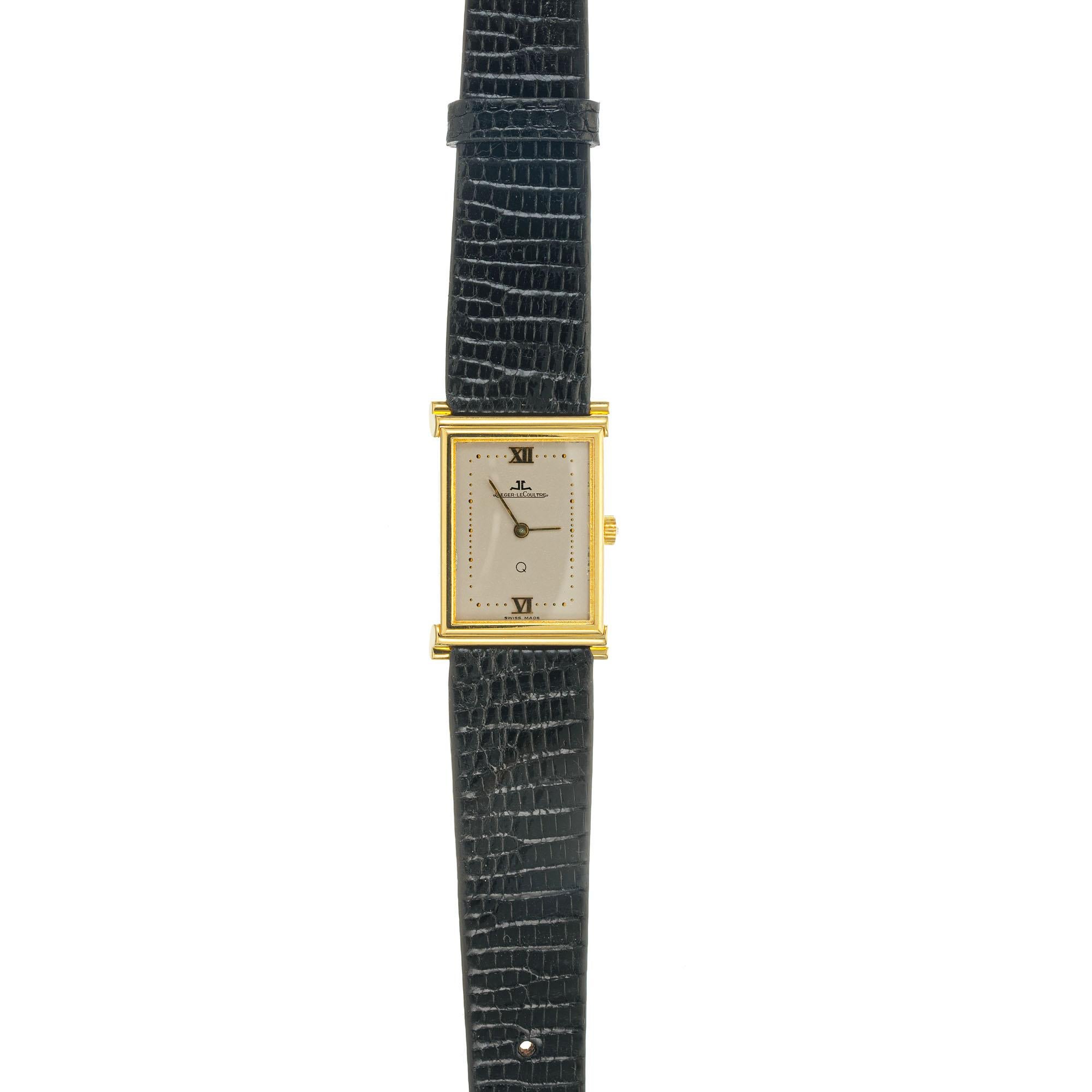 Mens or ladies Jaeger Le Coultre 18k black lizard strap watch. Circa 1990's

29.9 grams
Length: 33mm
Width: 22.69mm
Band width at case: 17mm
Case thickness: 5.36mm
Band: Genuine lizard 
Crystal: Sapphire 
Dial: gray 
Outside case: 140 034 1 341