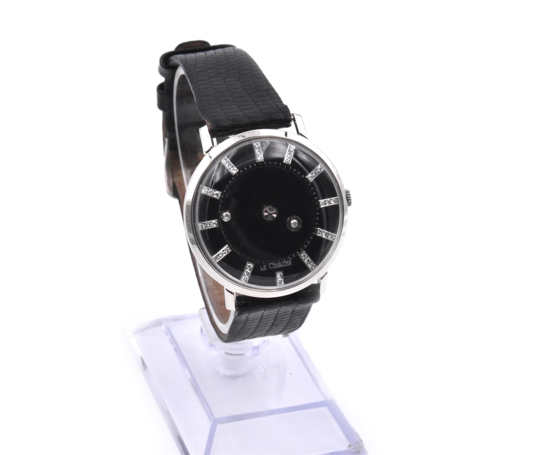 Movement: Manual Wind
Function: hours, minutes
Case: 33mm 14k white gold circular case, plexiglass crystal, push/pull crown
Dial: black dial, diamond dot hands, diamond hour markers
Band: black lizard strap with stainless steel buckle
  

Does not