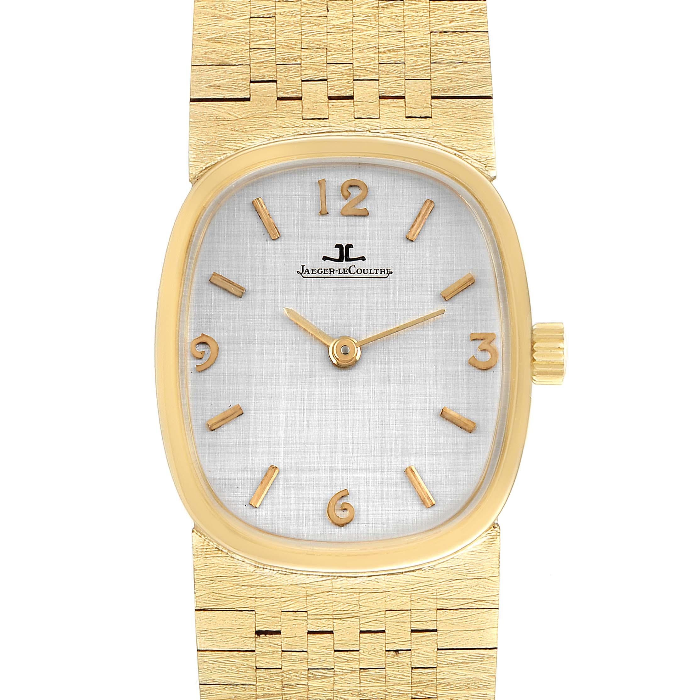 Jaeger LeCoultre 14k Yellow Gold Manual Vintage Mens Watch. Manual-winding movement. 14k yellow gold oval case 31 mm x 26 mm in diameter. 14k yellow gold bezel. Acrylic crystal. Silver linen pattern dial with raised yellow gold baton and arabic