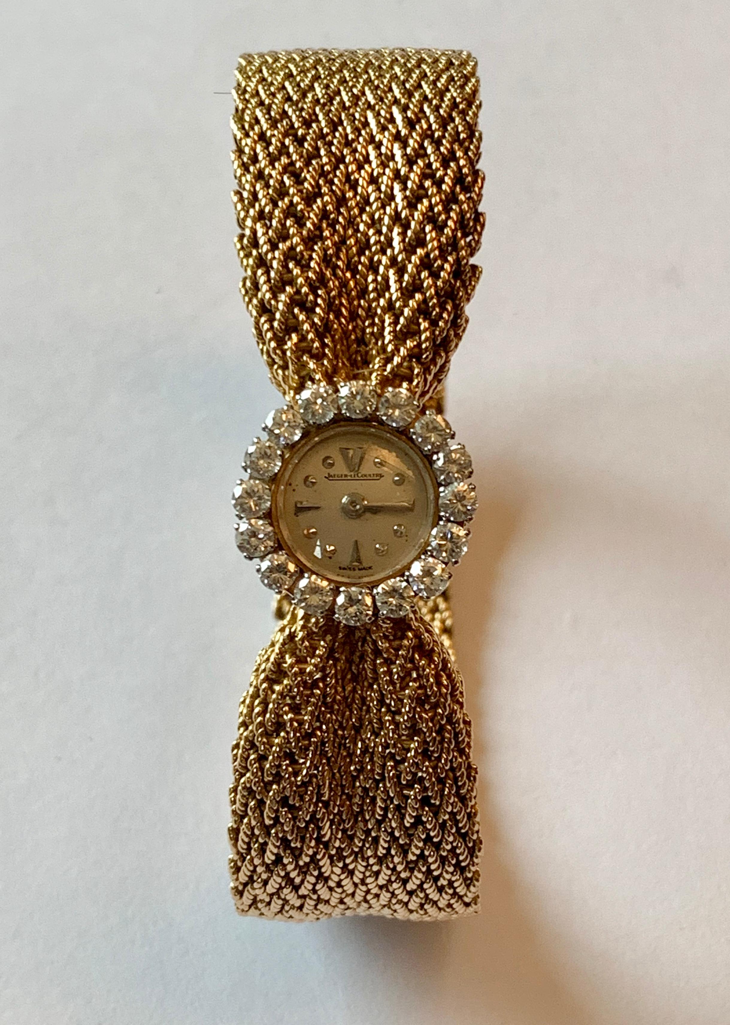 This classic and sophisticated ladies dress watch was produced by the premier house of  Jaeger LeCoultre in the mid-century. The Lady's dress watch is classy and sophisticated! Manual winding. 16 brilliant cut Diamonds weighing approximately 1 ct.
