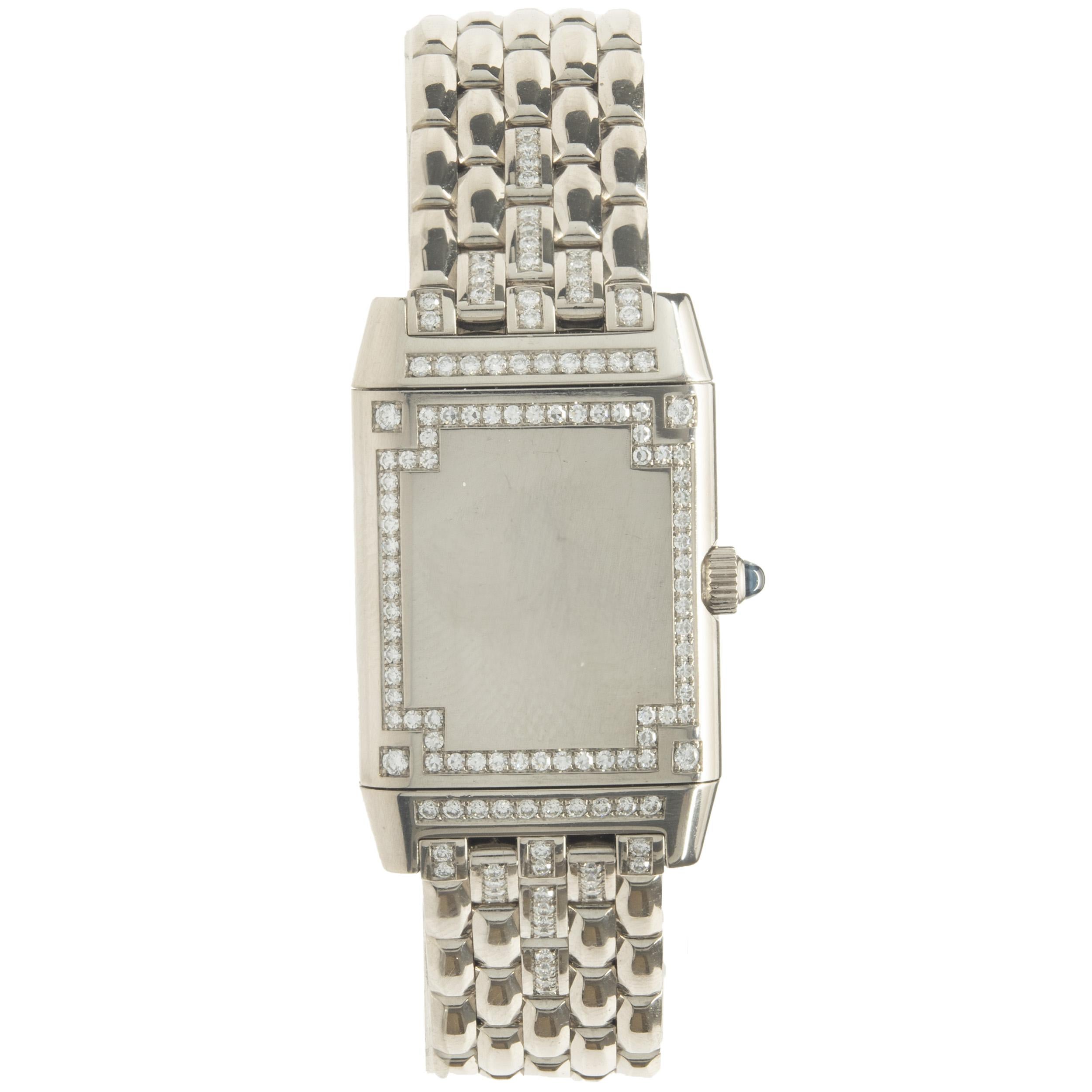Movement: manual
Function: hours, minutes
Case: 20mm 18K white gold rectangular case, diamond bezel
Dial: white arabic/diamond dial
Band: 18K white gold link bracelet, integrated clasp
Reference #: 267.3.86
Serial #: 1982XXX
  
Complete with