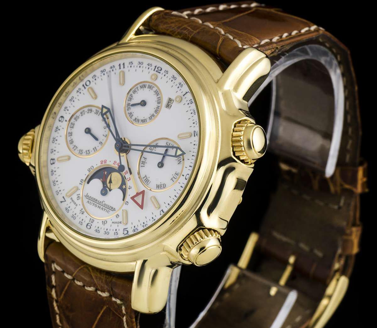 An 18k Yellow Gold Perpetual Calendar Alarm Grande Reveil Gents Wristwatch, white dial with applied hour markers, blue steel skeletonised hands, red arrowed alarm hand, year aperture at 1 0'clock, weekday sub-dial at 3 0'clock, moonphase and 24 hour
