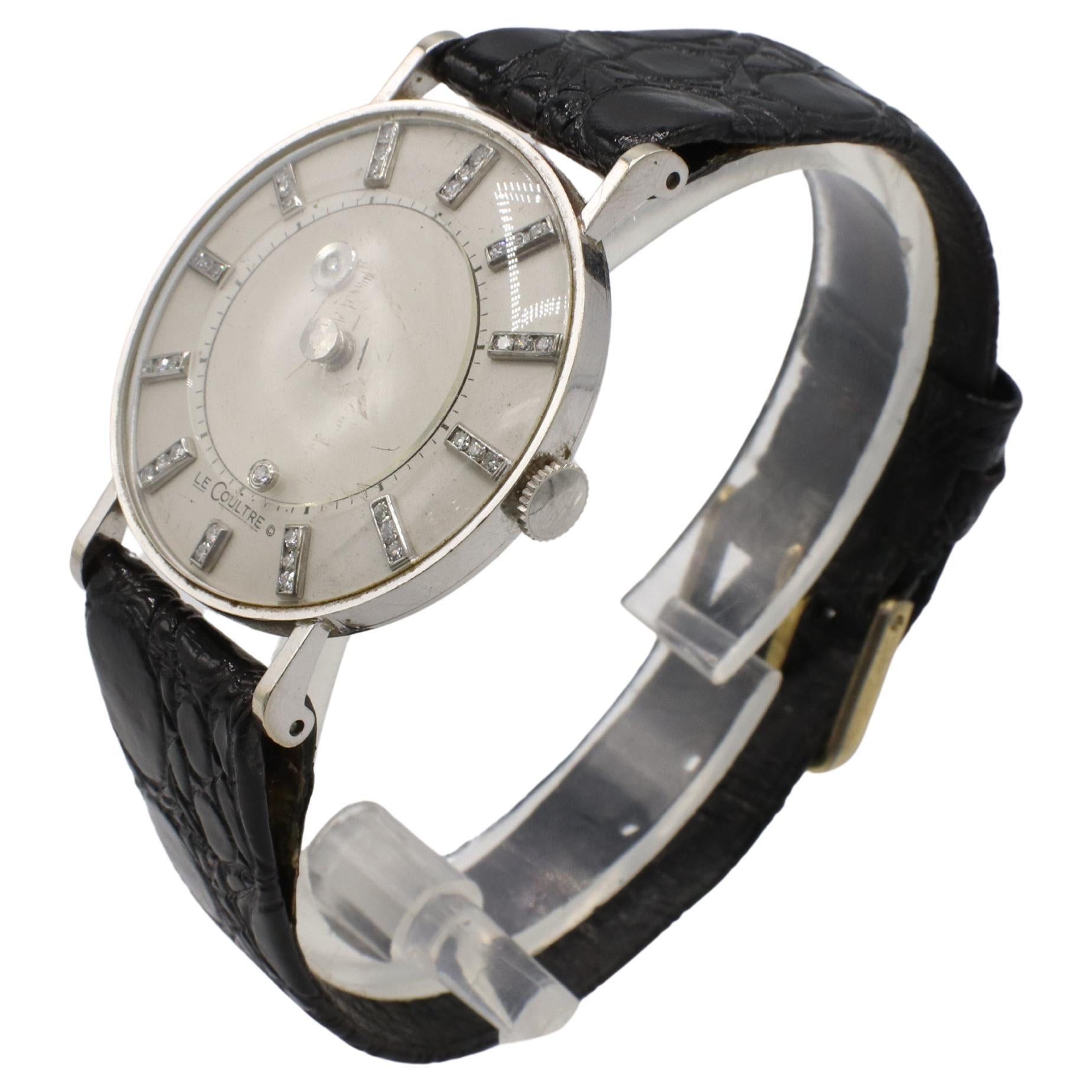 Jaeger-LeCoultre 1957 Vacheron & Constantin Vintage Galaxy Mystery Dial Natural Diamond Watch
Metal: 14k white gold
Case size: 33mm
Movement: Manual wind
Crystal: Acrylic, slight scratches 
Strap: Aftermarket black leather, buckle is not gold
Dial: