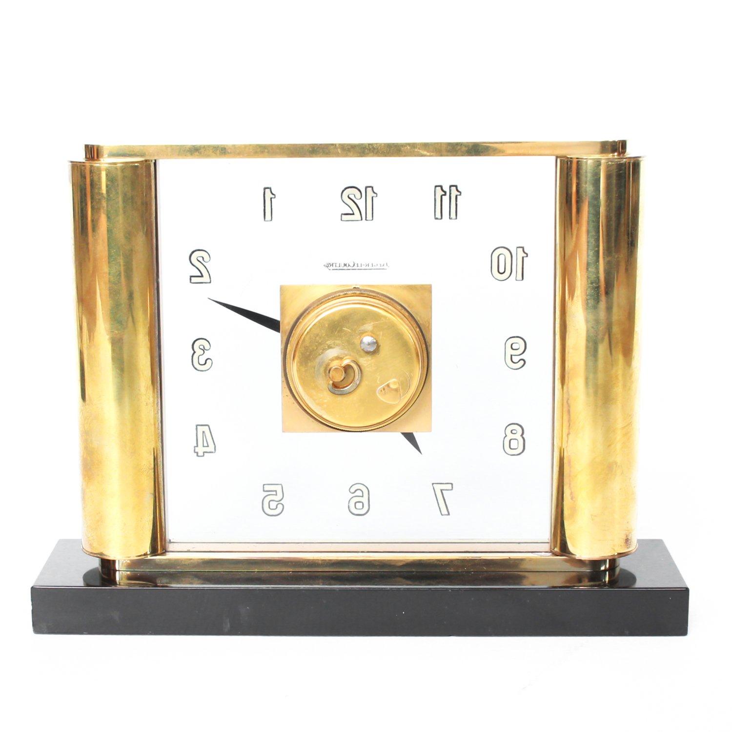 A Jaeger-LeCoultre, Art Deco, brass, and glass clock. Original mechanism with eight day movement. In good working order.

In 1903, Paris based watchmaker Edmond Jaeger set a Challenge for Swiss manufacturers to develop and produce ultra-thin
