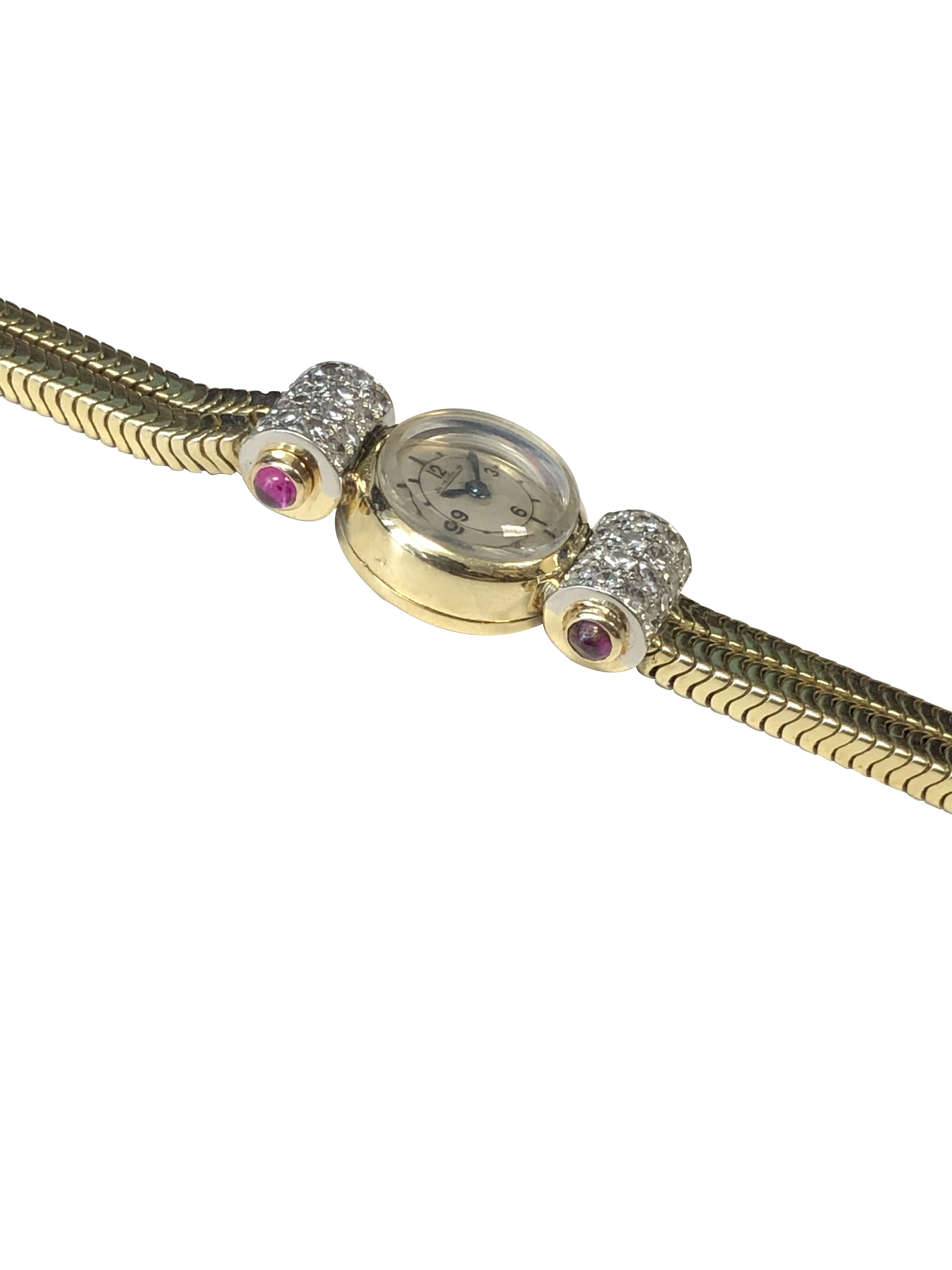 Circa 1930s Jaeger LeCoultre Ladies Art Deco Wrist Watch, 14 M.M. 18K Yellow Gold 2 piece case. 17 Jewel Mechanical, Manual Back wind movement, silver satin dial. The sides of the case are set with 4 rows of Diamonds totaling .40 Carat and Further