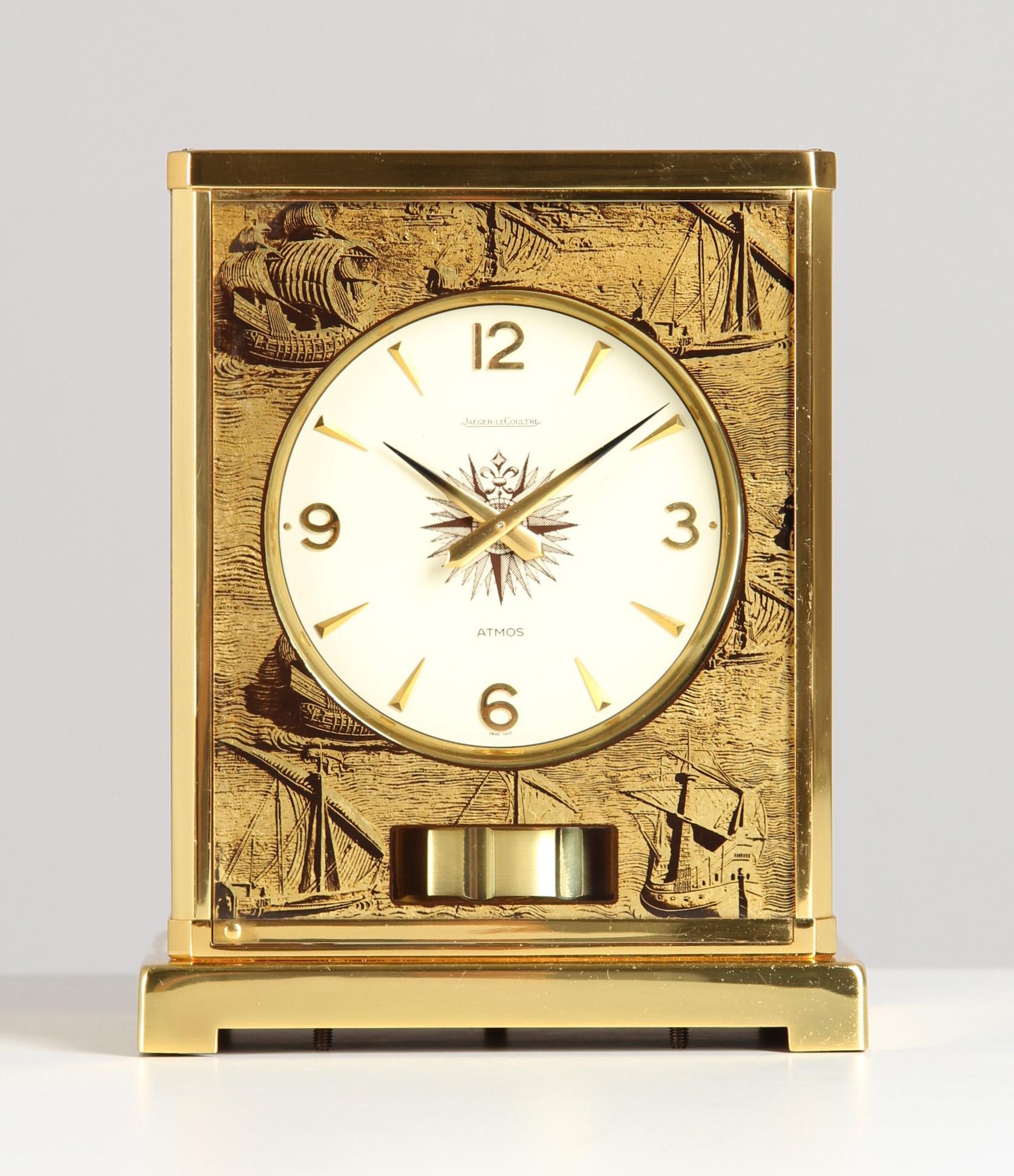 Jaeger LeCoultre - Atmos Feuille d'or Motif Caravelle

Switzerland
Brass gold plated
Year of manufacture 1965

Dimensions: H x W x D: 22 x 18 x 13.5 cm

Description:
Atmos clock calibre 526 in the special 