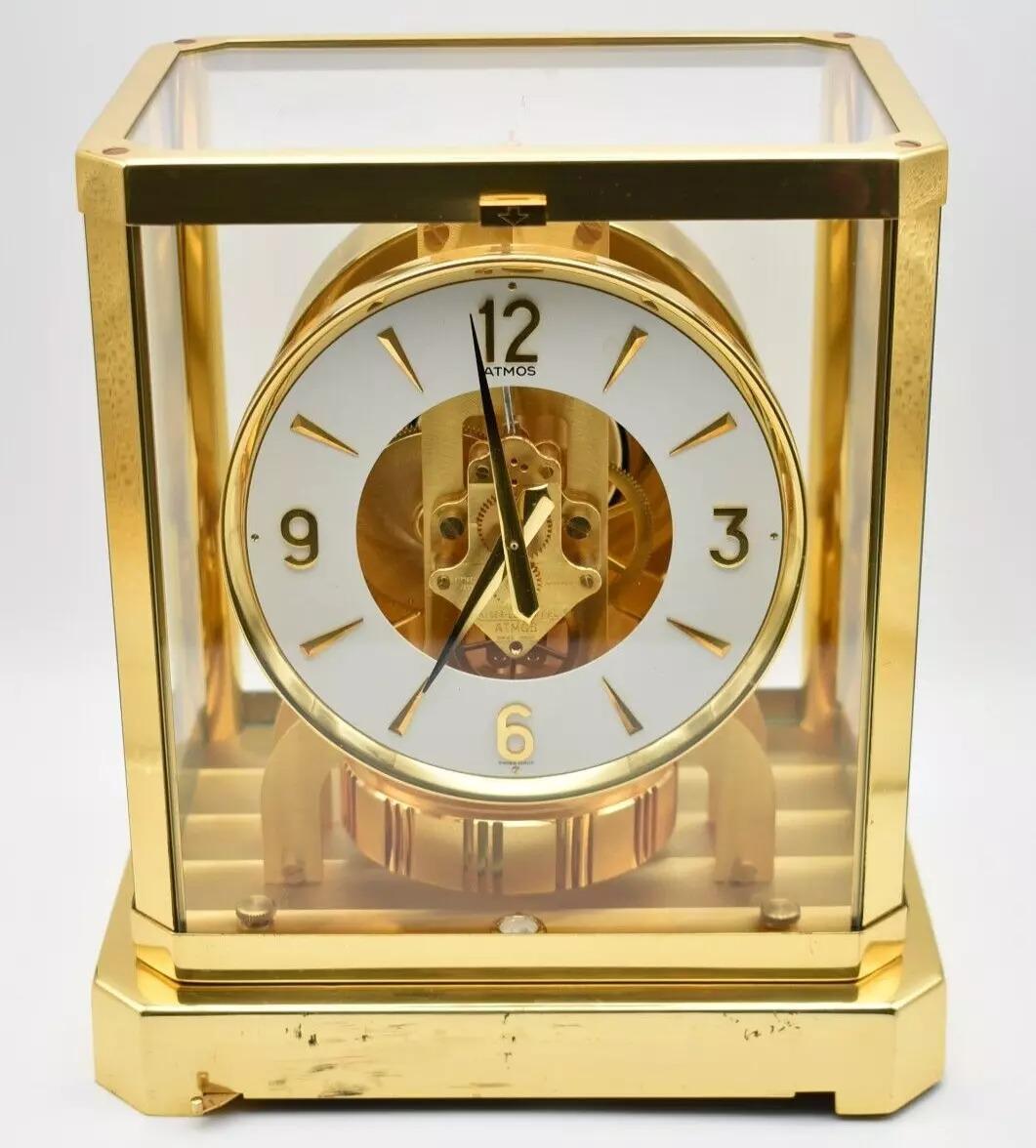 The vintage Jaeger-LeCoultre Atmos mantel clock is a remarkable feat of horological engineering, renowned for its ability to keep time through perpetual motion, powered by changes in barometric pressure and temperature. This Swiss-made clock