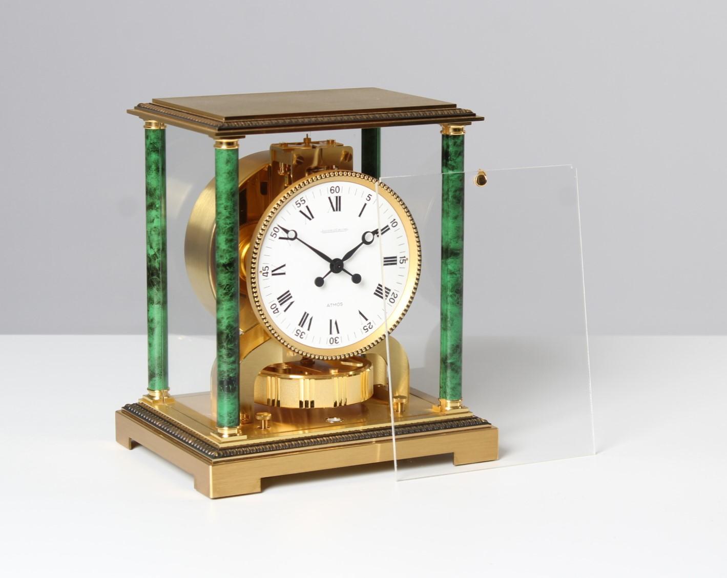 Atmos Vendome with brass base by Jaeger LeCoultre

Switzerland
Brass gold plated and lacquered
Year of manufacture 1972

Dimensions: H x W x D: 24 x 21 x 16 cm

Description:
Atmos Vendome calibre 526 with gilt base and marbled