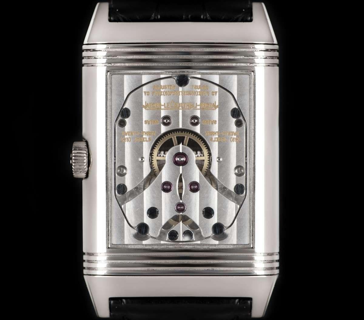 An 18k White Gold Day & Night Reverso Gents Wristwatch, black dial with arabic numbers, day & night indicator at 2 0'clock, small seconds and moonphase at 6 0'clock, 40 hour power reserve indicator at 11 0'clock, reverse side with exhibition
