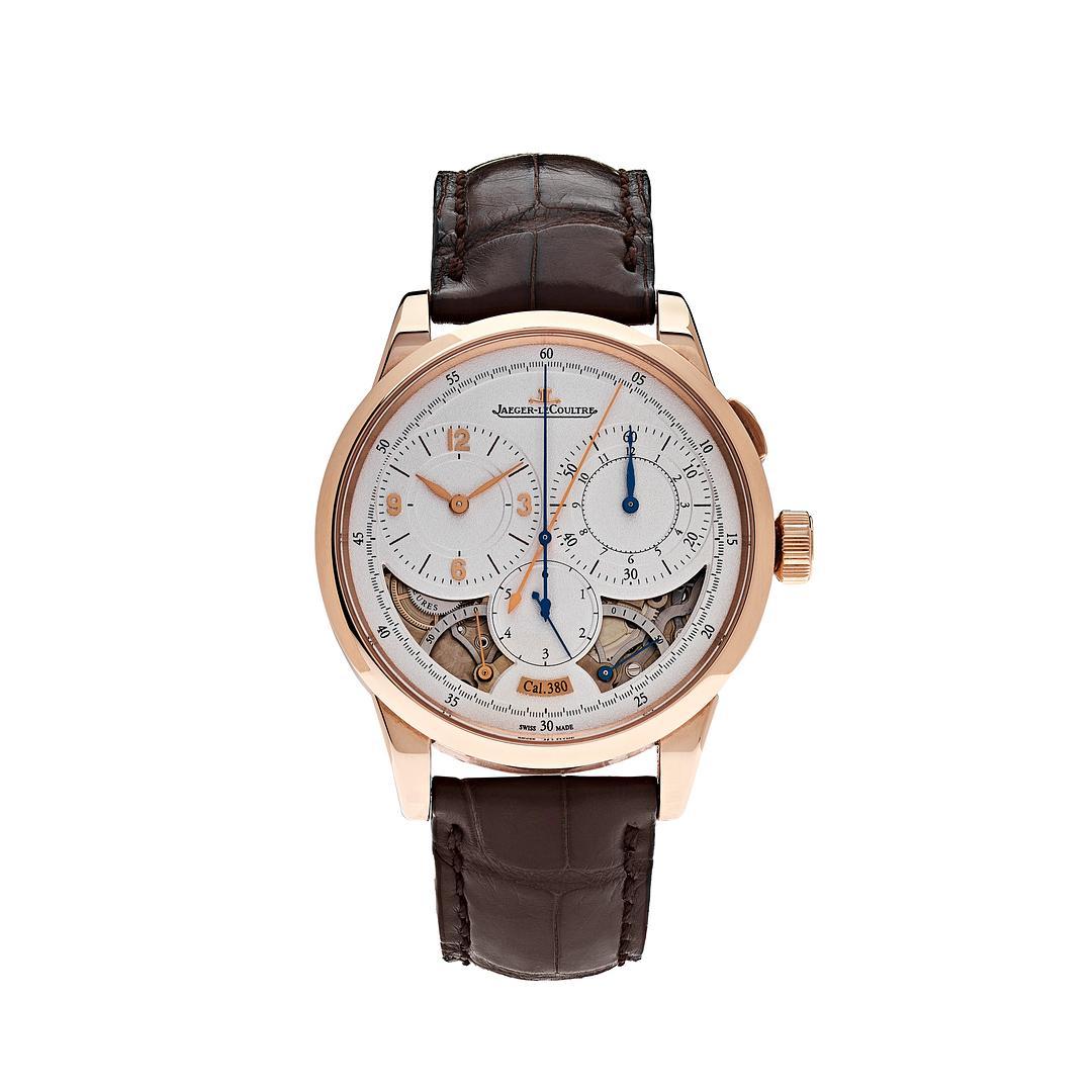  This Jaeger LeCoultre Duometre Chronograph is crafted in a rose gold case measuring 42mm. The silver dial features a skeletal display and three sub dials. The watch comes on a brown alligator leather strap and tang buckle.

Reference Number	