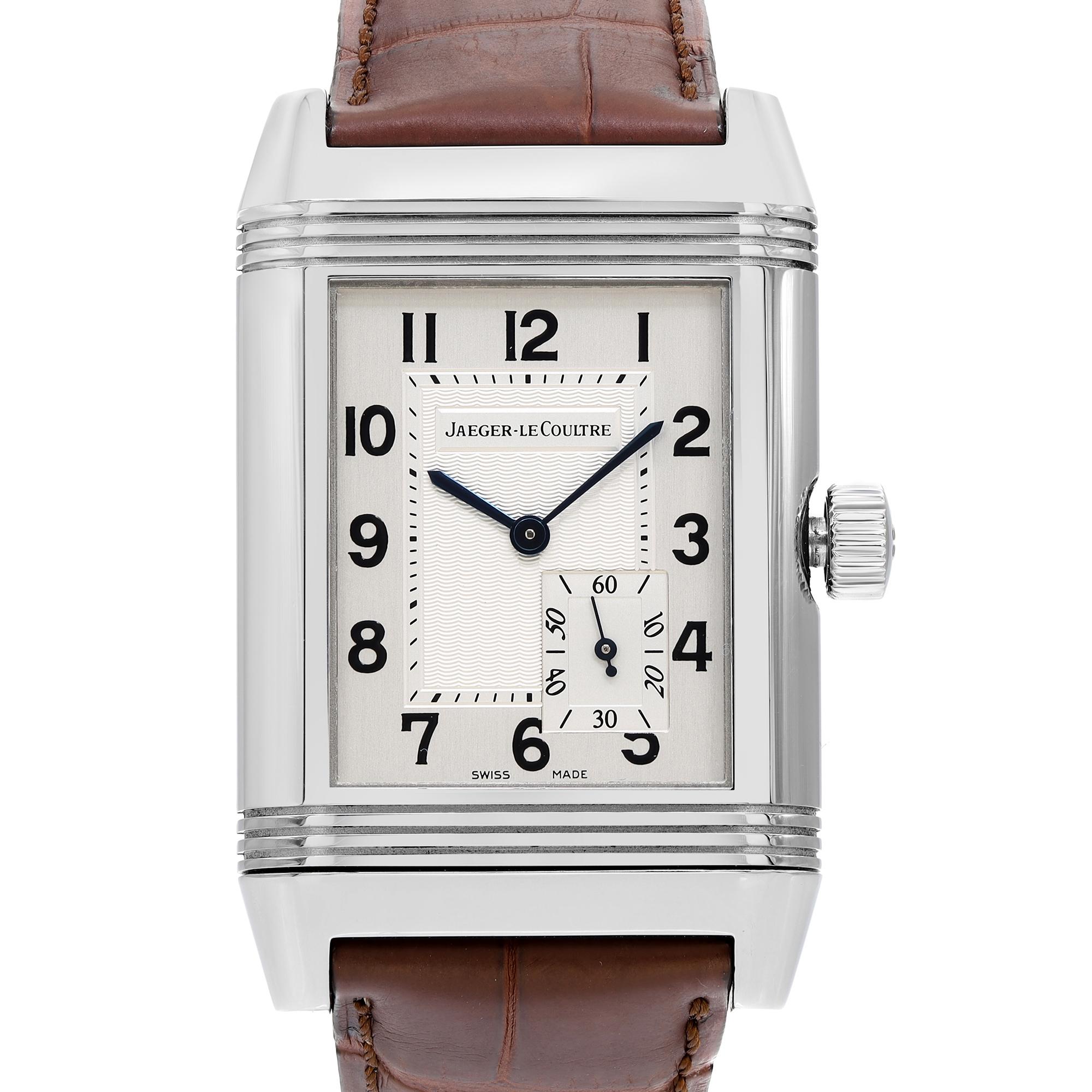 Pre-owned Jaeger-LeCoultre Grande Reverso Men's Watch Q3018420. Original Box and Papers are Included. Certificate dated 2004. Case Measurement 29X46.5mm. This Timepiece is Powered by a Mechanical (Hand-Winding) Movement and Features: Stainless Steel