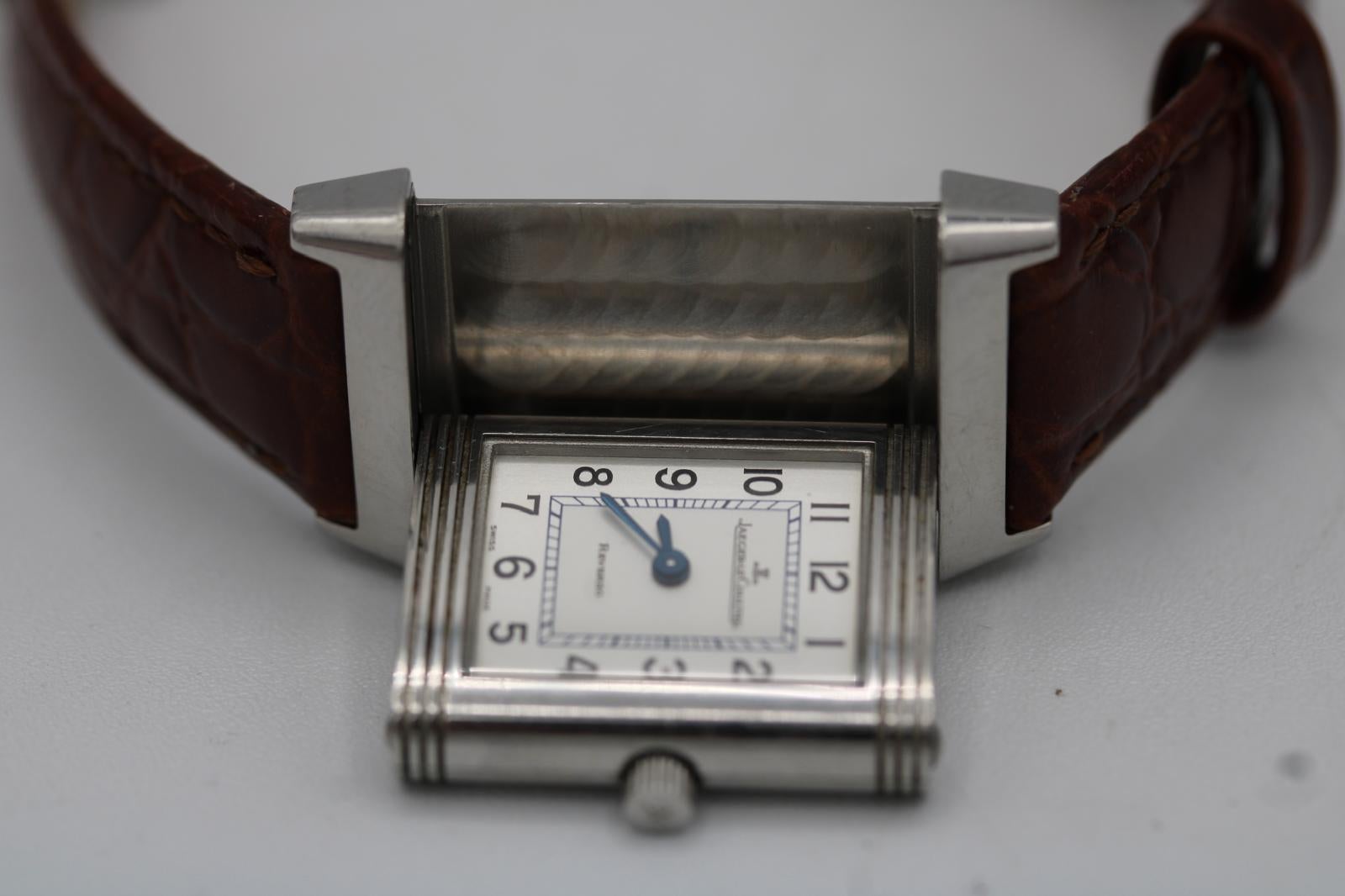 Jaeger-LeCoultre Reverso 260.8.47  Quartz  Silver Dial  19mm x 33mm  Deployment Clasp
A timeless and elegant offering from one of the most respected names in watchmaking, this JLC Reverso 260.8.47 is a sleek, refined quartz model that delivers all