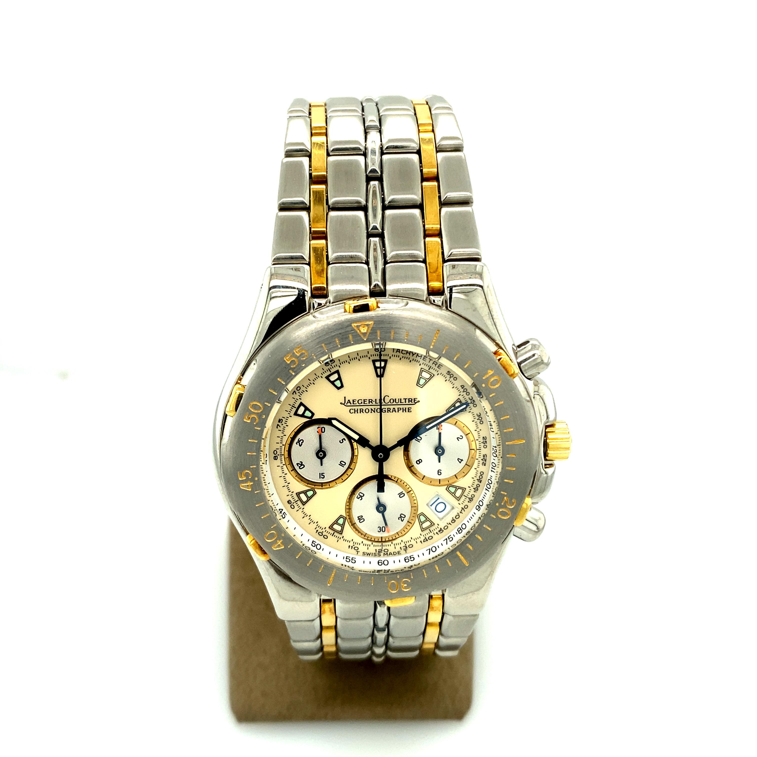 25-jewel quartz movement, white dial with luminous filled trapezoid hour markers, black outer minute divisions and tachymeter scale, raised outer base scale, blued steel waisted baton hands with luminous inserts and centre chronograph hand, gilt