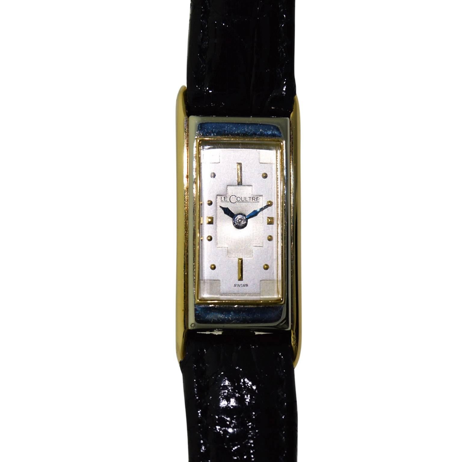 FACTORY / HOUSE: Jaeger Le Coultre  
STYLE / REFERENCE: Art Deco / Duo Plan
METAL / MATERIAL: Two Tone 18Kt. White and Yellow Gold 
CIRCA: 1940
DIMENSIONS: 33 mm X 14 mm
MOVEMENT / CALIBER: Manual Winding / 17 Jewels 
DIAL / HANDS: Silvered with