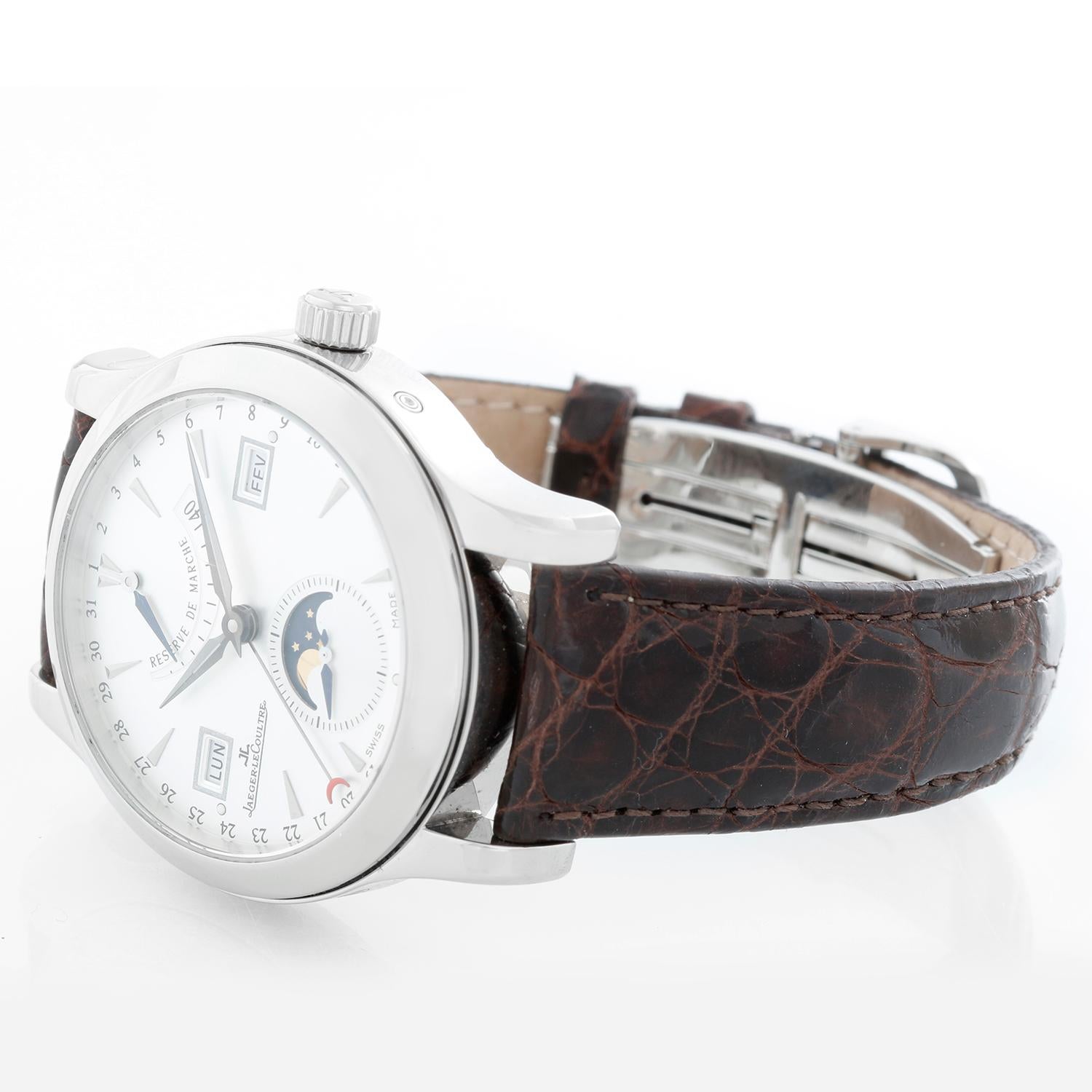 Jaeger-LeCoultre Master Calendar Men's Stainless Steel Watch 151.84.2A 147.8.41S - Automatic winding. Full Calendar, Moon Phase, Month, Date, Day, Hour, Minute, Small Second . Stainless steel case with exposition back  (40mm diameter). Silvered dial