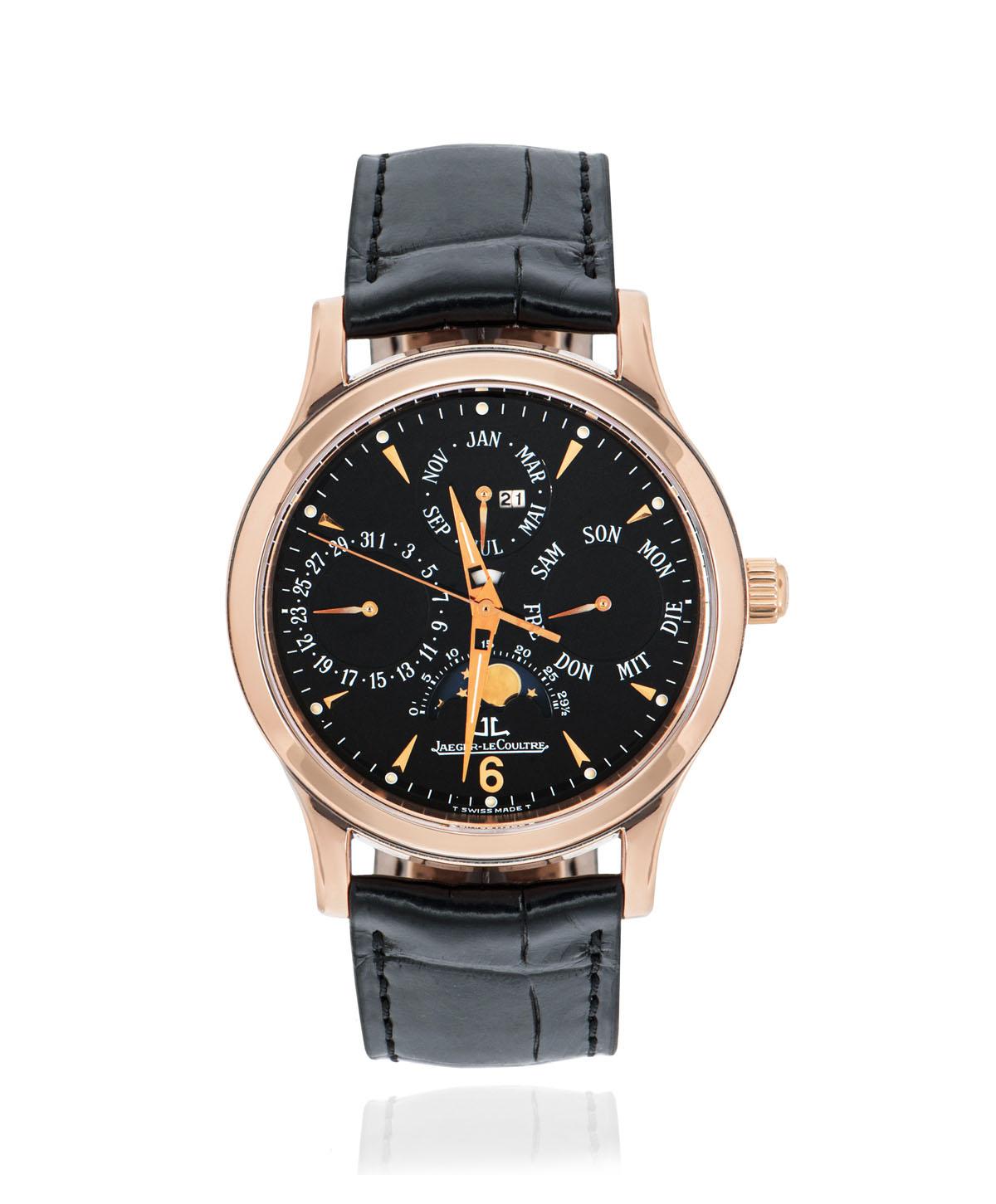 A 37 mm Master Control Perpetual Calendar in rose gold by Jaeger LeCoultre. Features a black dial with displays of the moon phases, the day, the date, month and year. Just above the centre of the dial is a day/night indicator.

An original brand new